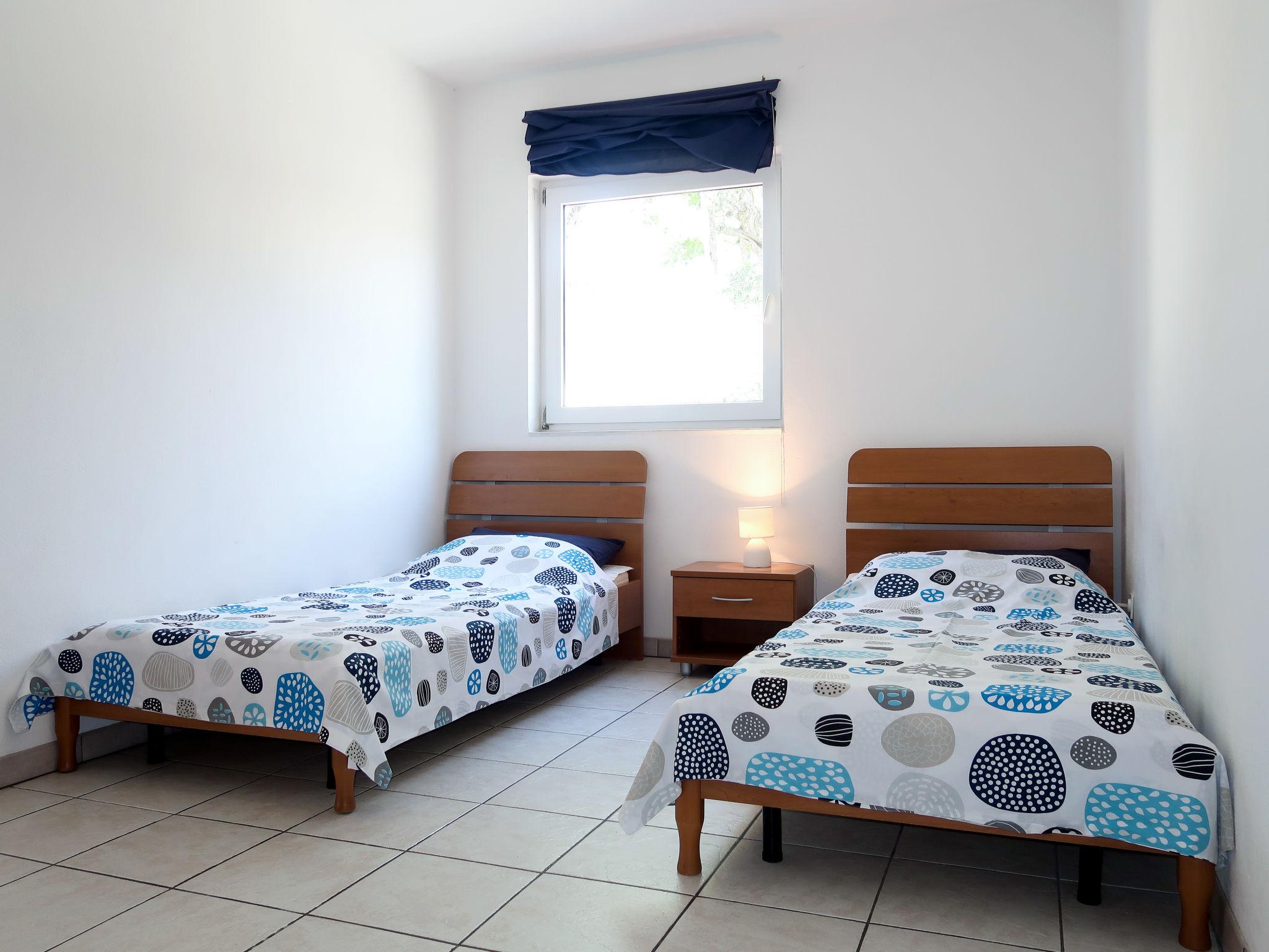 Foto 6 - Appartamento con 4 camere da letto a Rab con terrazza e vista mare