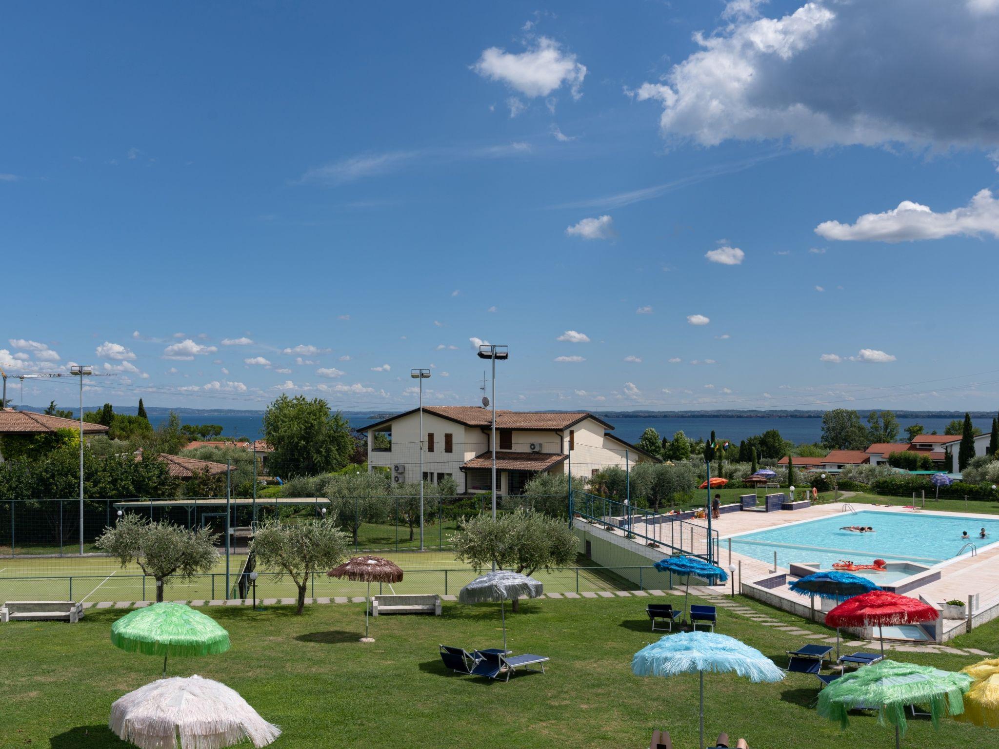 Foto 27 - Apartamento de 2 habitaciones en Moniga del Garda con piscina y vistas a la montaña