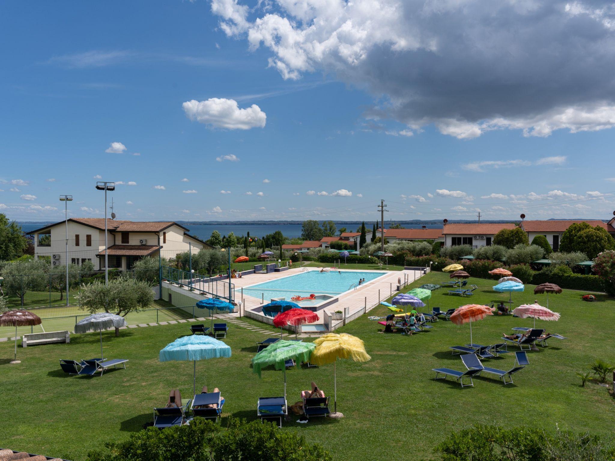 Foto 1 - Appartamento con 2 camere da letto a Moniga del Garda con piscina e vista sulle montagne