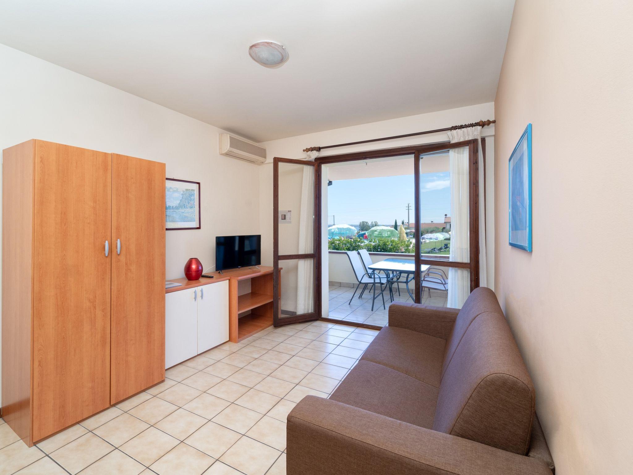 Foto 5 - Apartamento de 2 quartos em Moniga del Garda com piscina e vista para a montanha