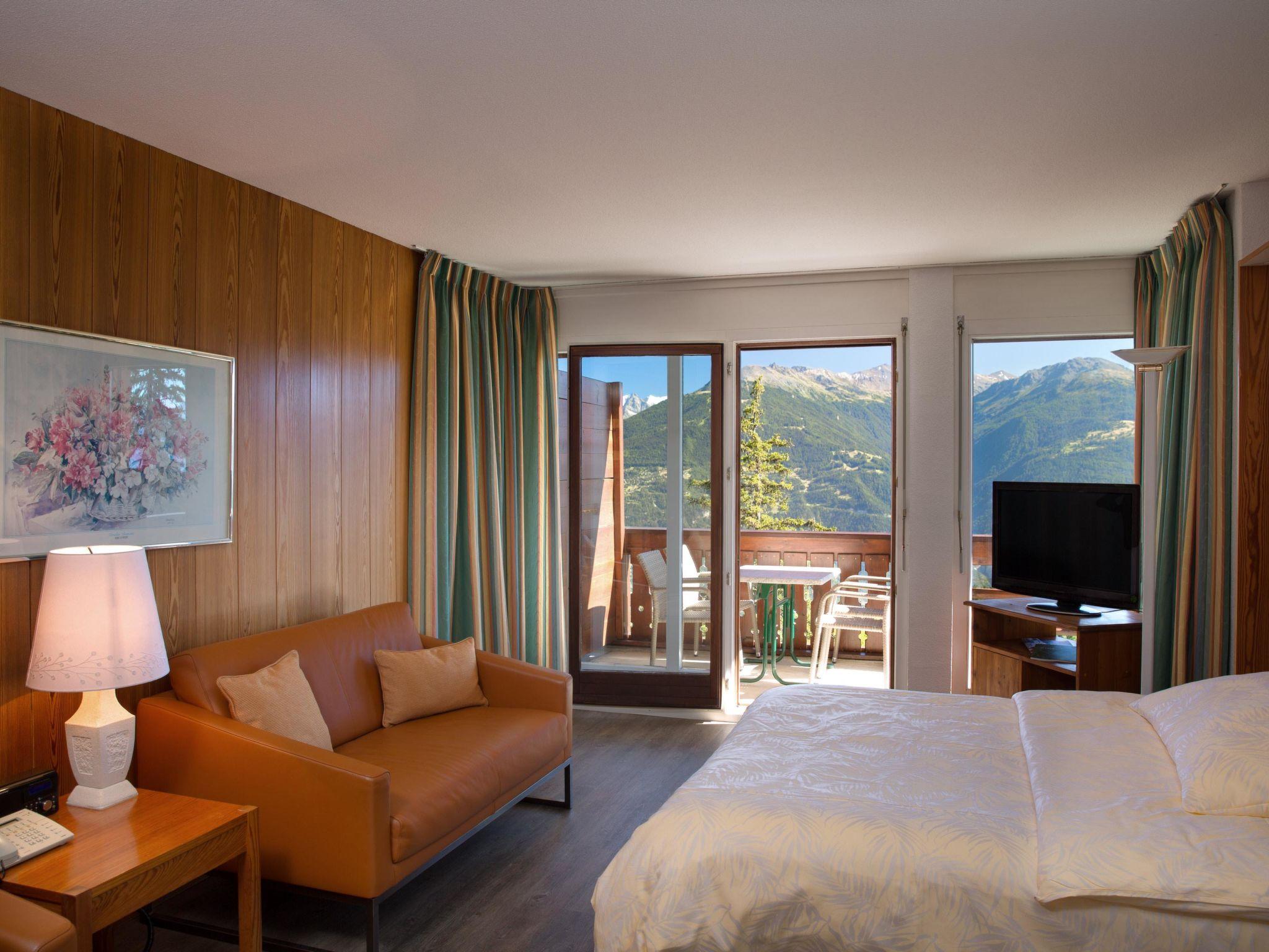 Foto 2 - Appartamento con 1 camera da letto a Crans-Montana con piscina e vista sulle montagne
