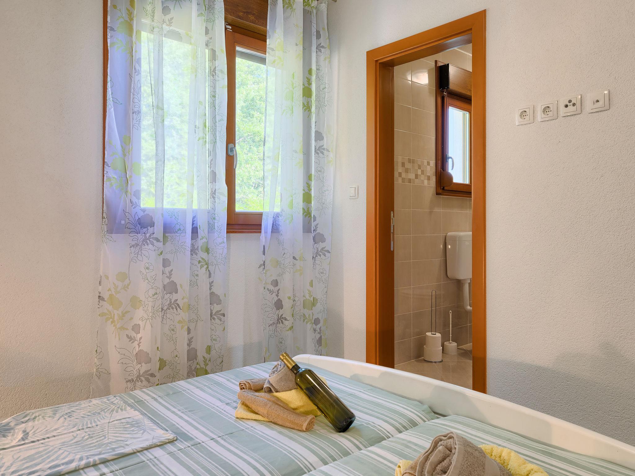 Foto 19 - Casa con 3 camere da letto a Žminj con piscina privata e vista mare