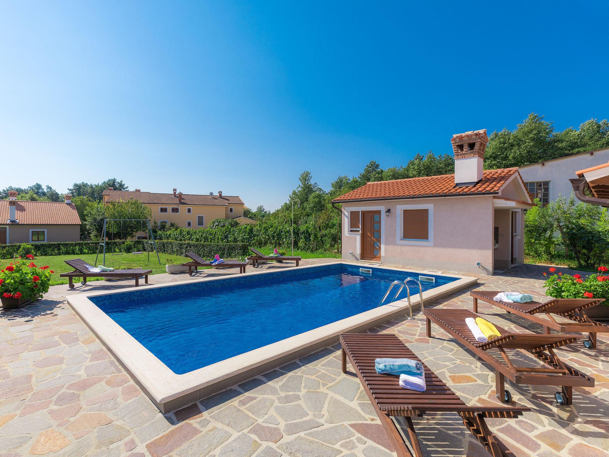Foto 7 - Casa con 3 camere da letto a Žminj con piscina privata e vista mare