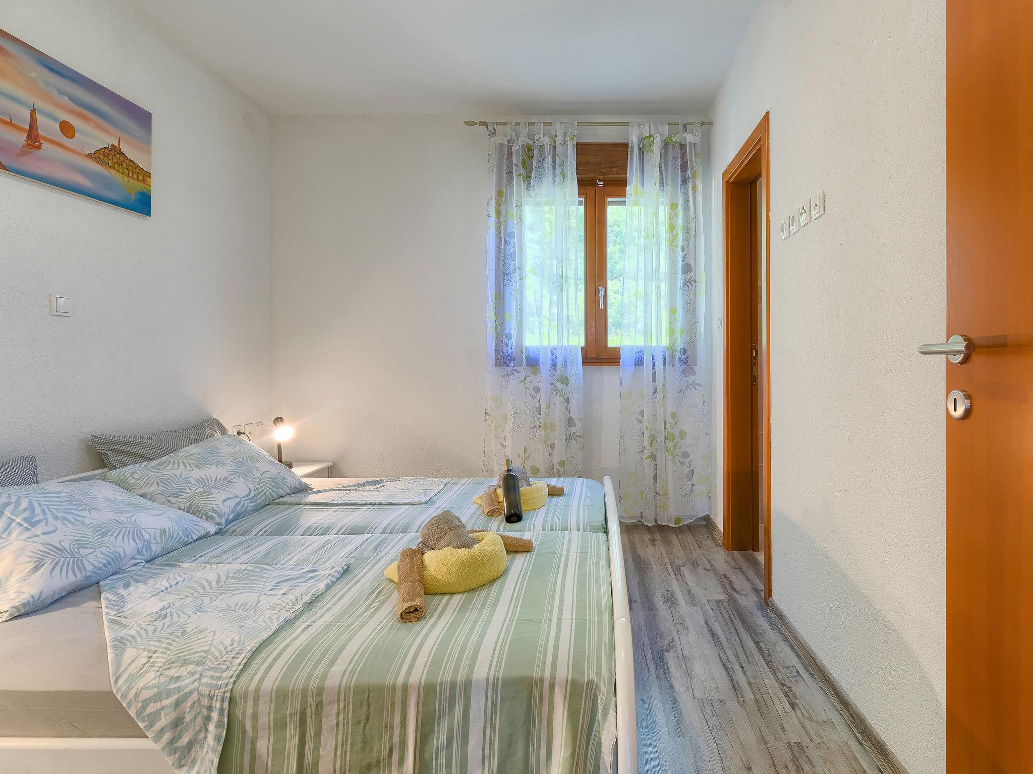 Foto 17 - Casa con 3 camere da letto a Žminj con piscina privata e vista mare