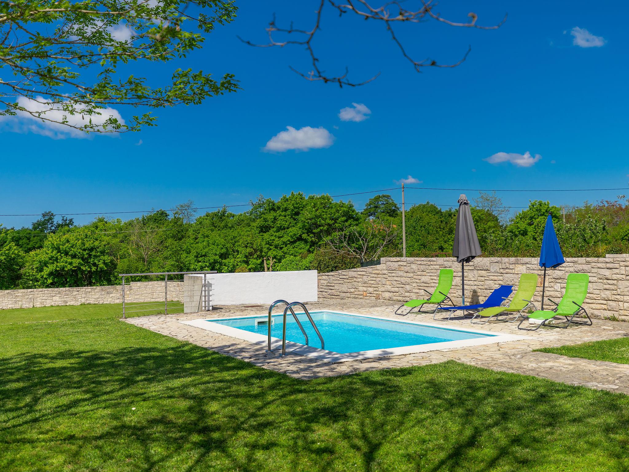 Photo 7 - Maison de 3 chambres à Žminj avec piscine privée et vues à la mer