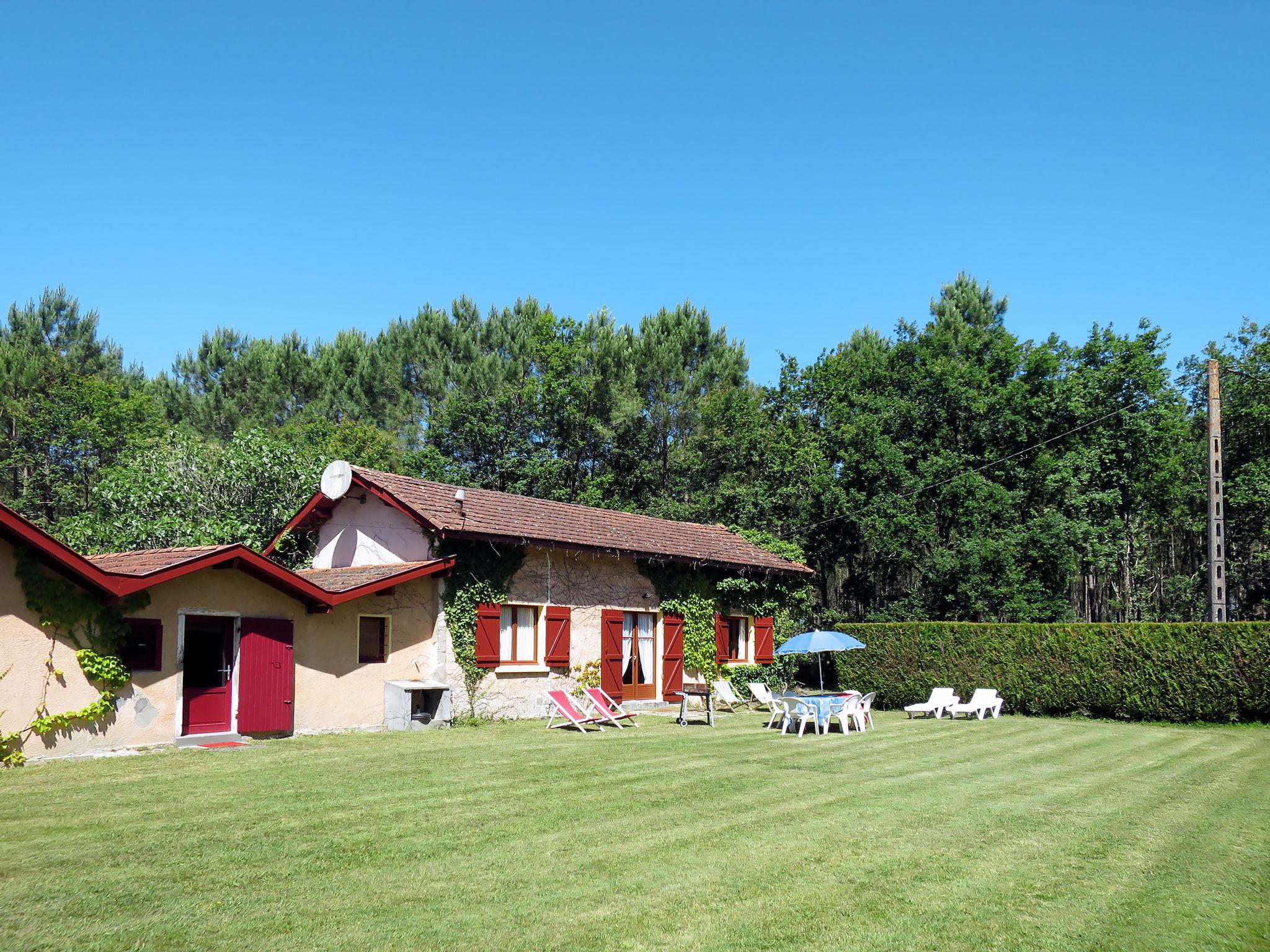 Foto 1 - Casa con 3 camere da letto a Le Porge con giardino e vista mare