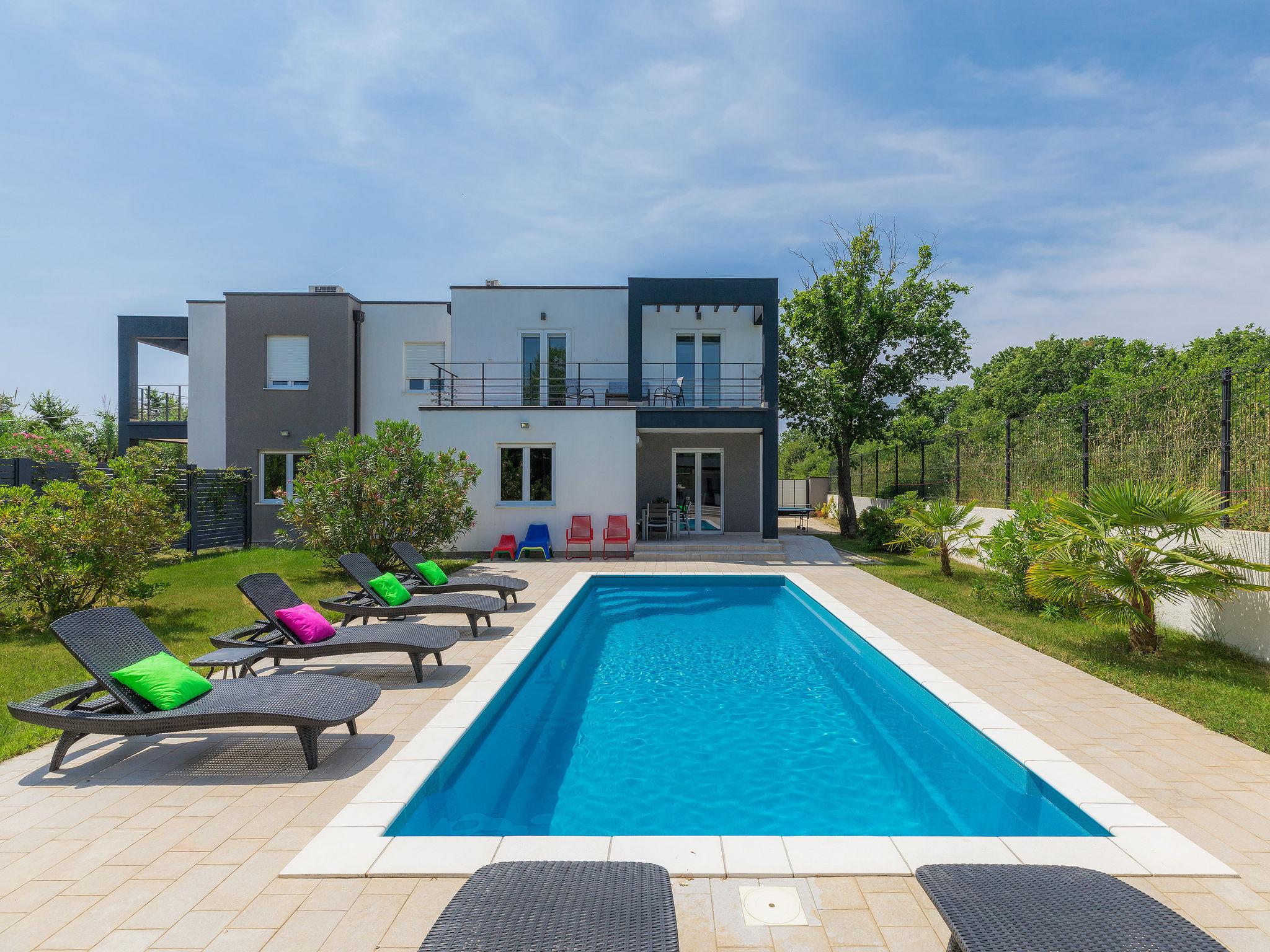 Photo 6 - Maison de 3 chambres à Ližnjan avec piscine privée et vues à la mer