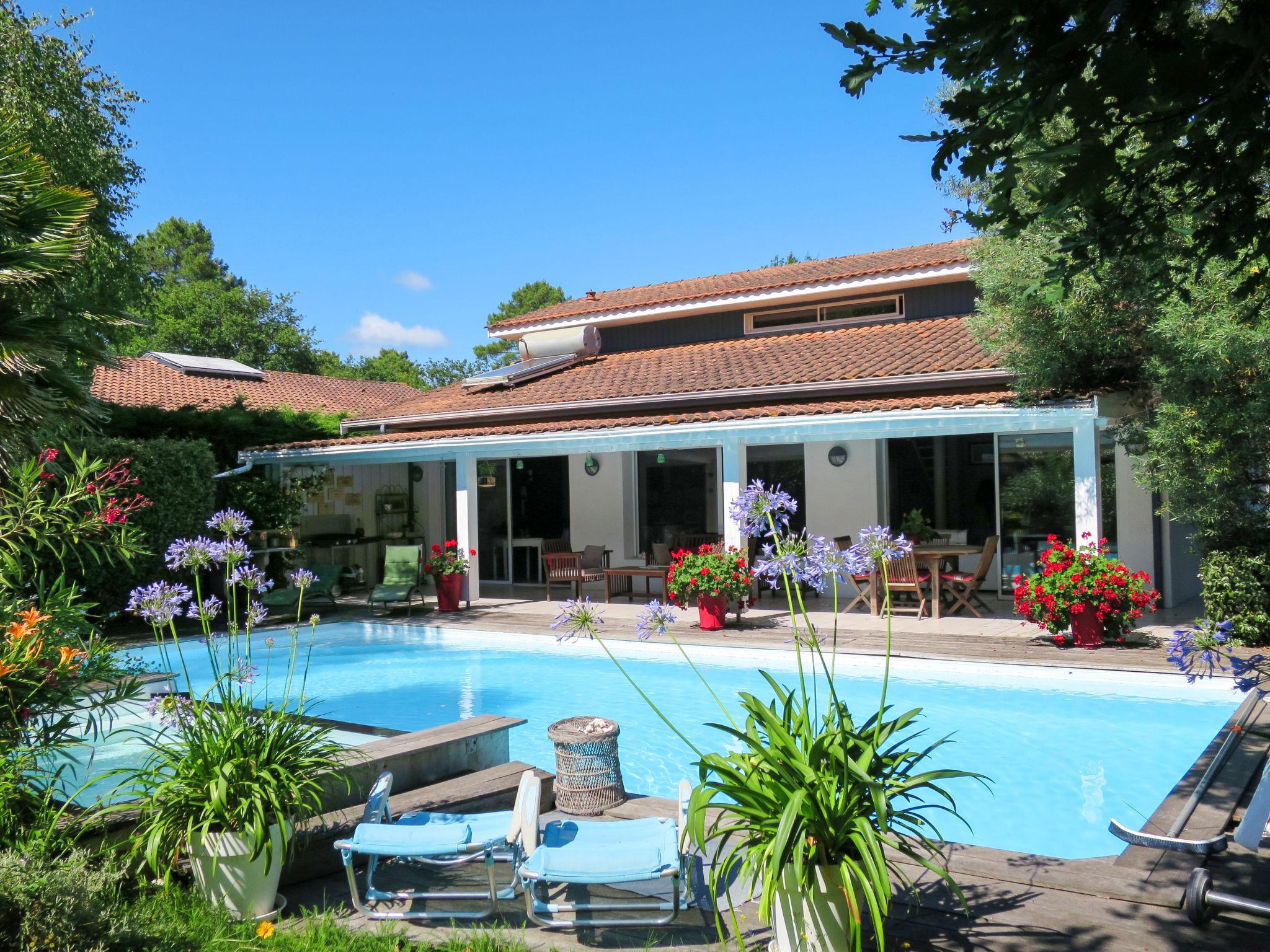 Foto 1 - Casa con 3 camere da letto a Andernos-les-Bains con piscina privata e vista mare