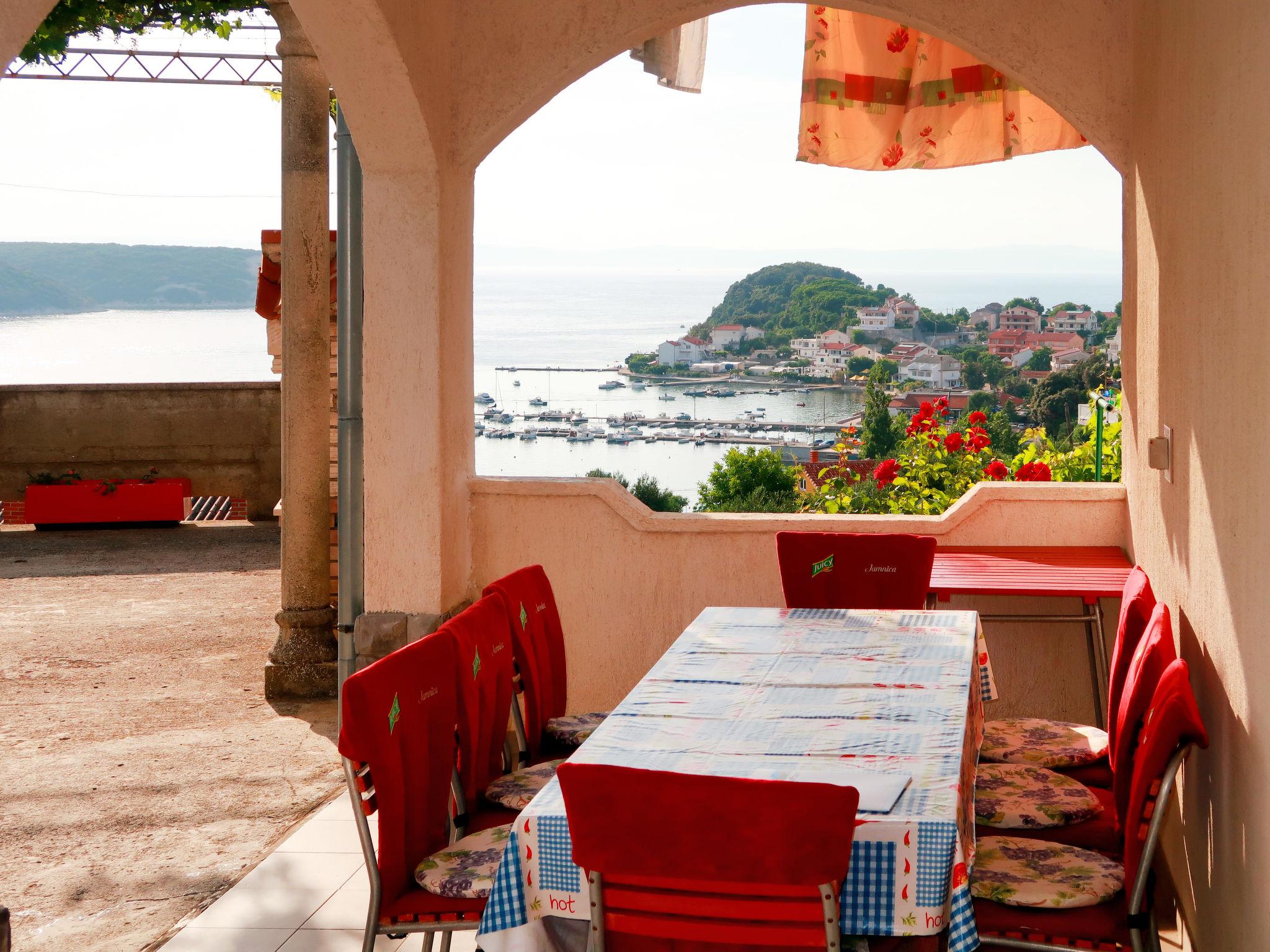 Photo 1 - Appartement de 4 chambres à Rab avec terrasse et vues à la mer