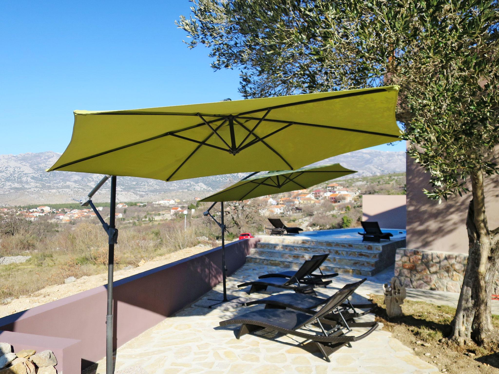 Photo 25 - Maison de 4 chambres à Jasenice avec piscine privée et vues à la mer