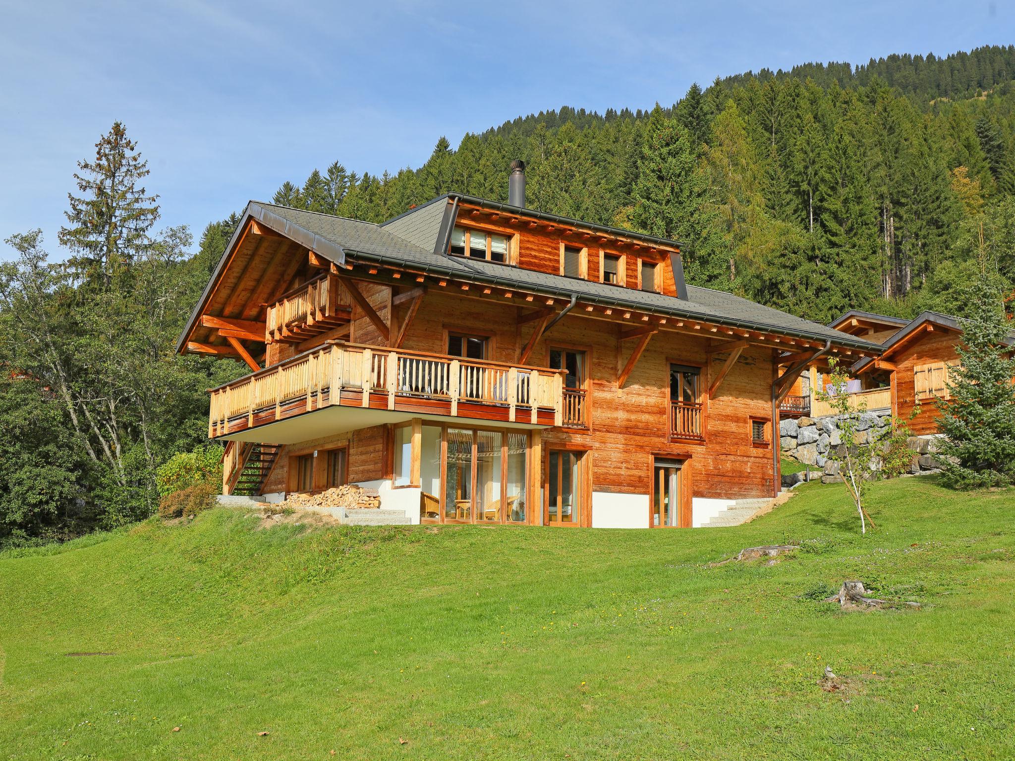 Foto 1 - Casa con 4 camere da letto a Ollon con giardino e vista sulle montagne