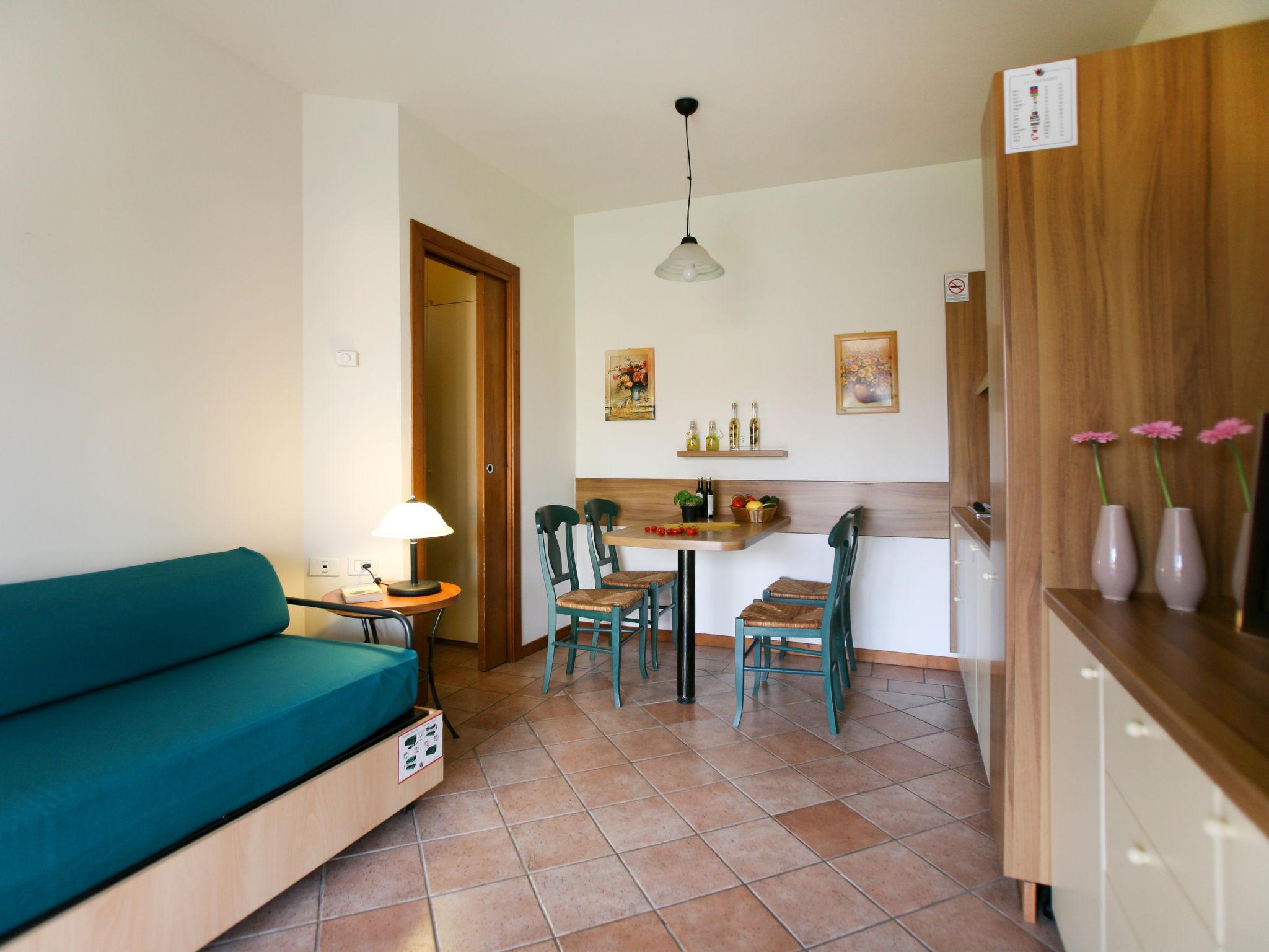 Photo 7 - Maison de 1 chambre à Sirmione avec piscine et vues sur la montagne