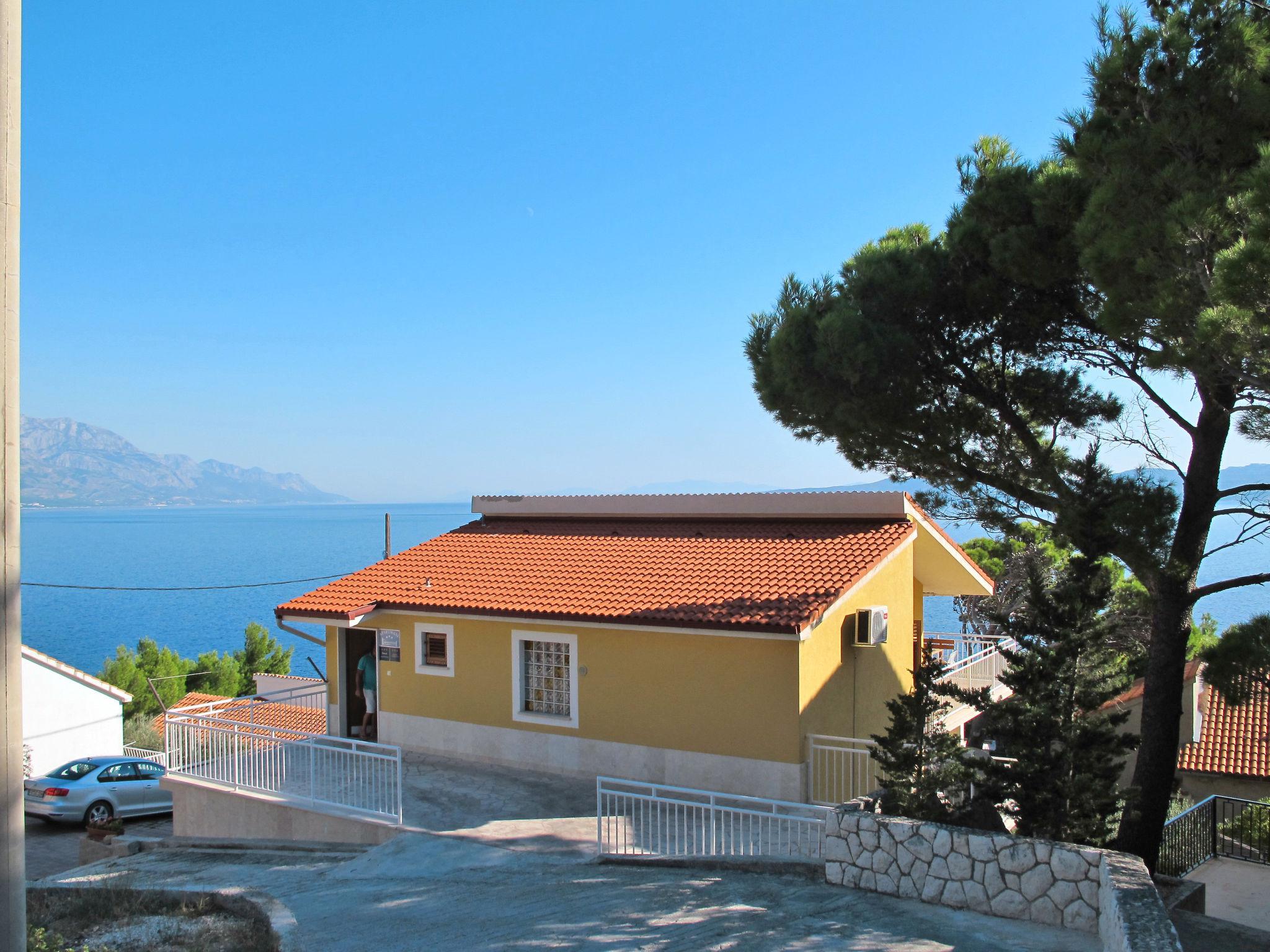 Foto 14 - Appartamento con 2 camere da letto a Omiš con vista mare