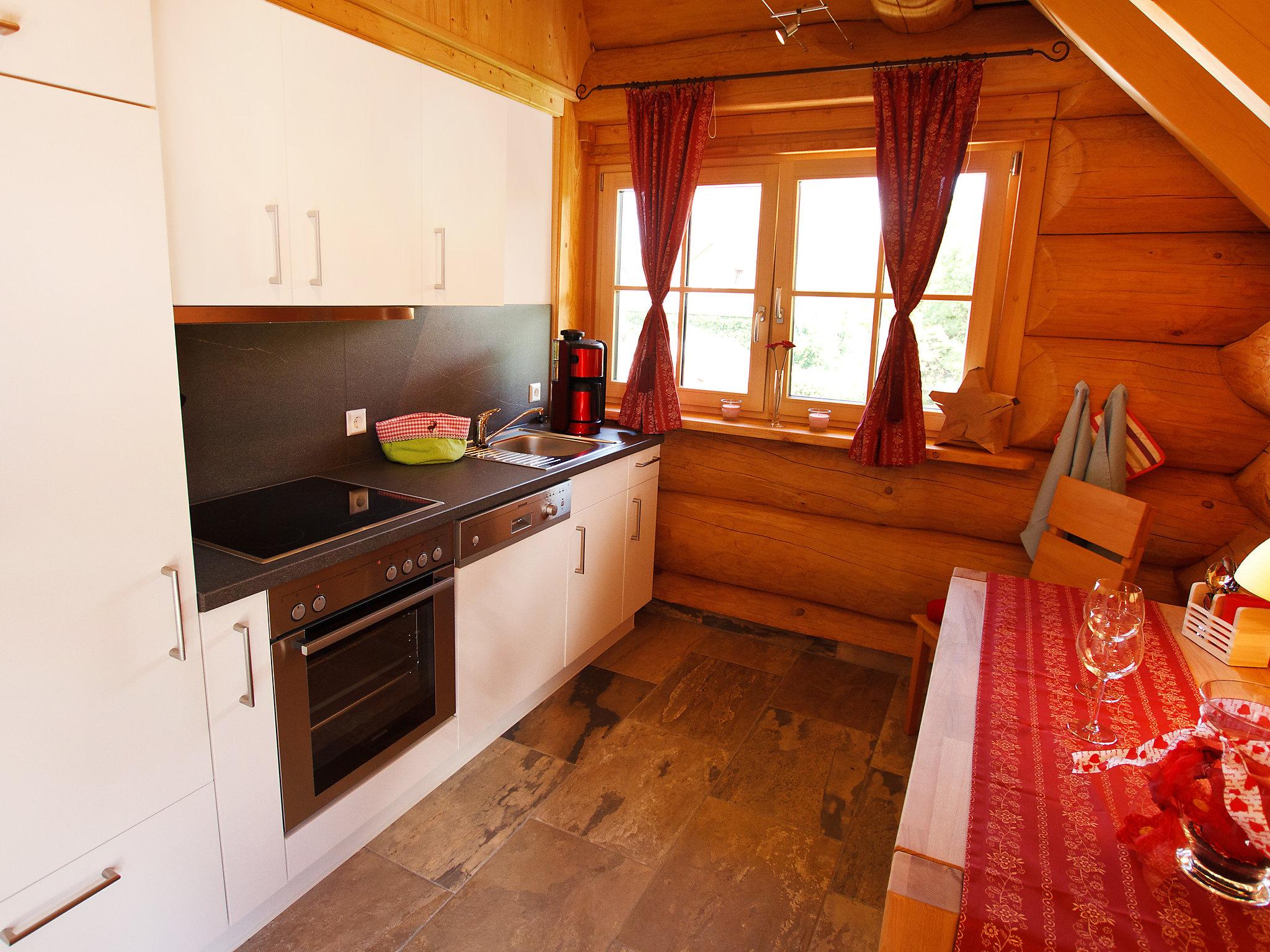 Foto 4 - Apartamento de 2 habitaciones en Großerlach con sauna y vistas a la montaña