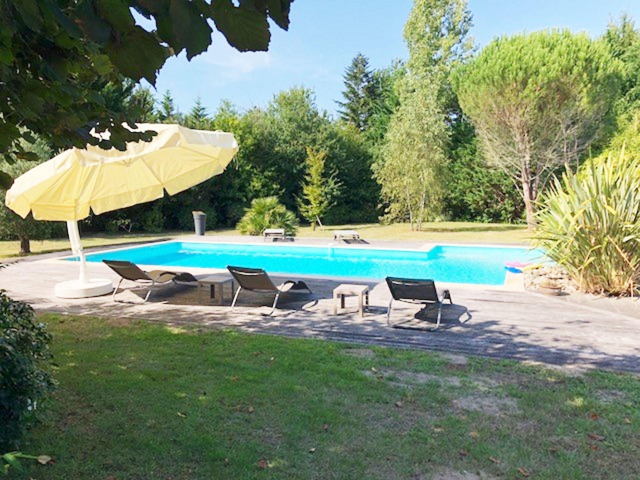 Foto 23 - Casa con 3 camere da letto a Mimizan con piscina privata e vista mare
