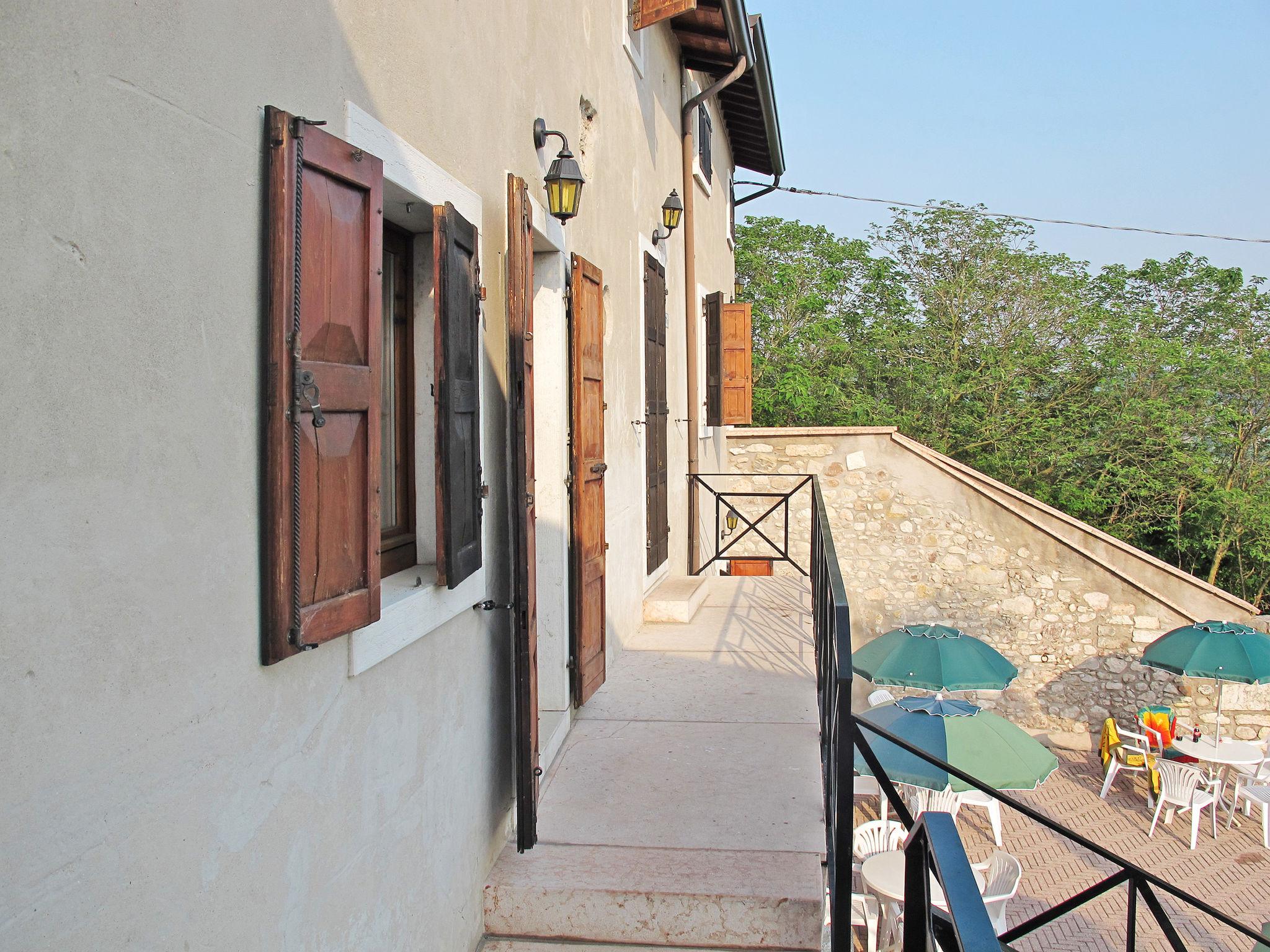 Photo 4 - Appartement de 1 chambre à Garda avec piscine et jardin