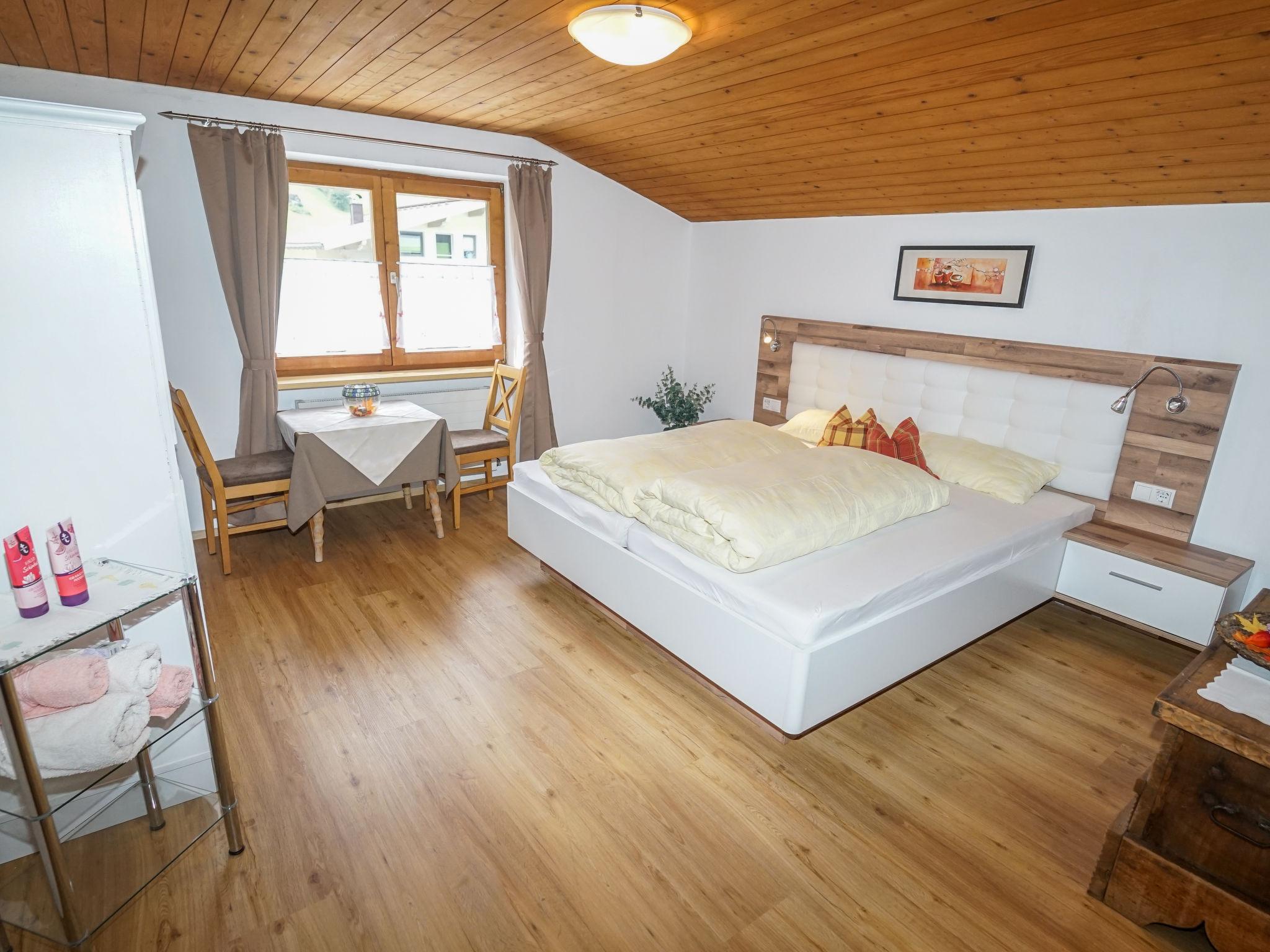 Foto 10 - Appartamento con 3 camere da letto a Aschau im Zillertal con giardino