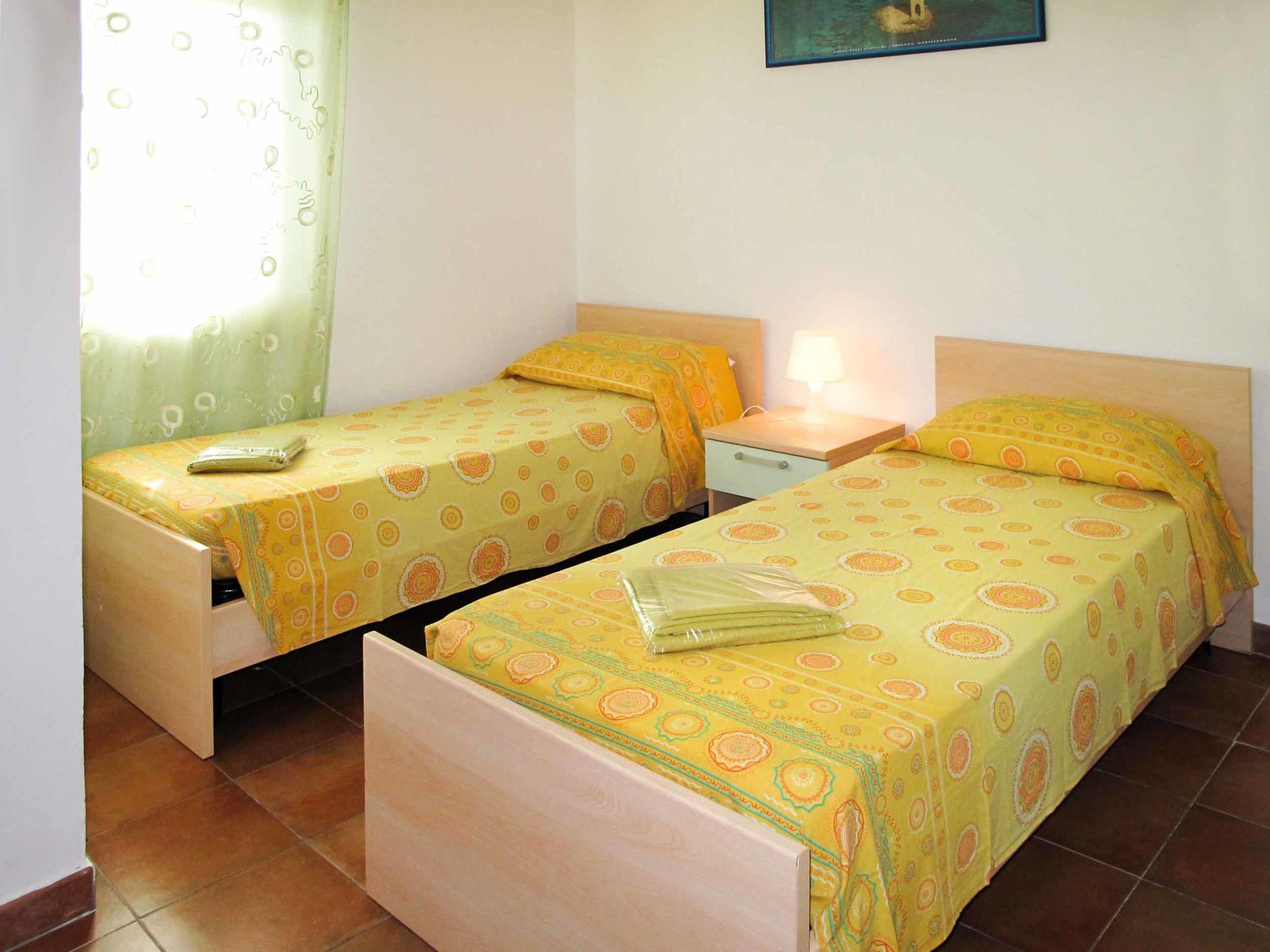 Foto 11 - Appartamento con 2 camere da letto a Cecina con piscina e vista mare
