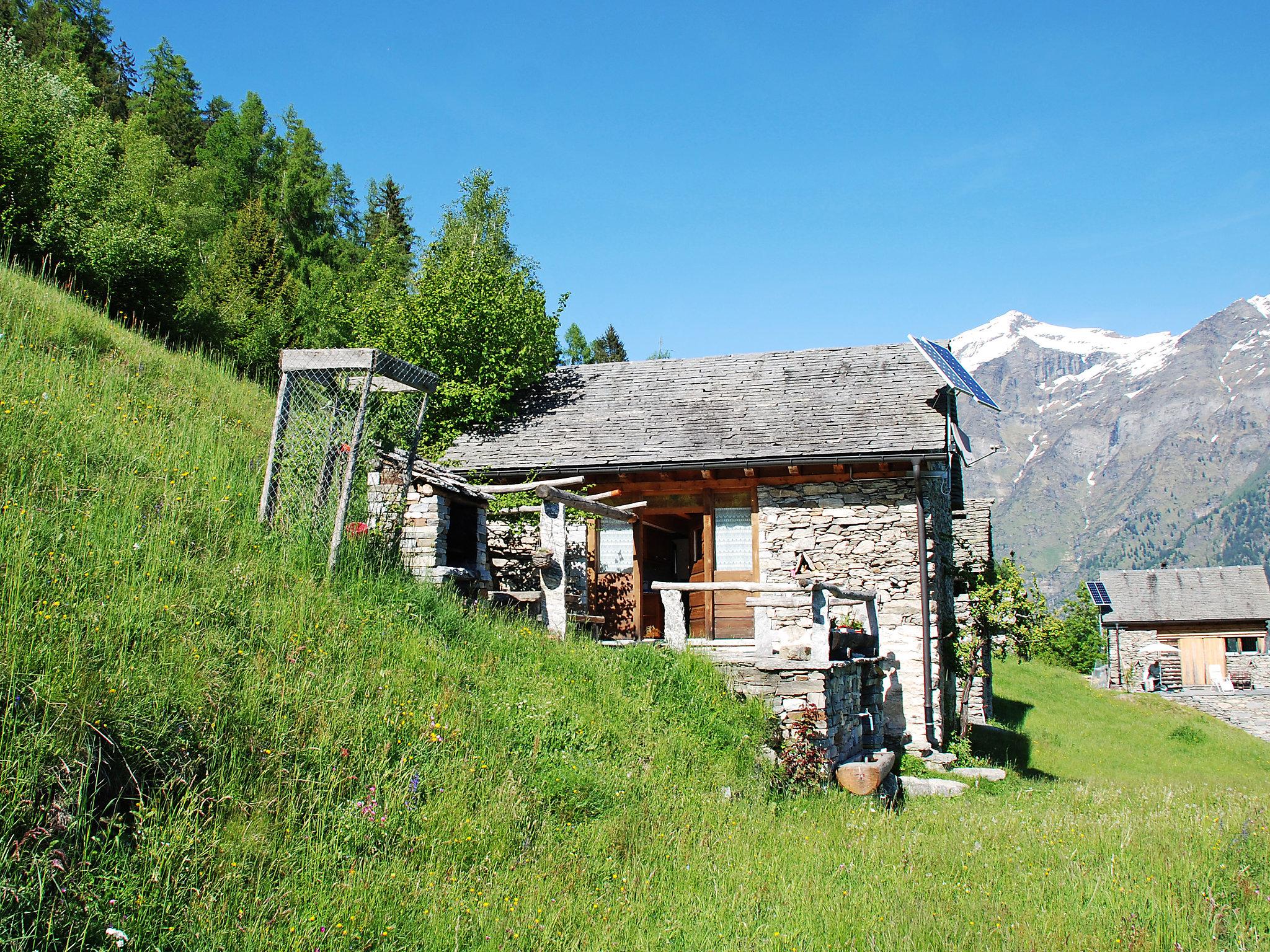 Foto 16 - Casa en Serravalle con jardín y vistas a la montaña