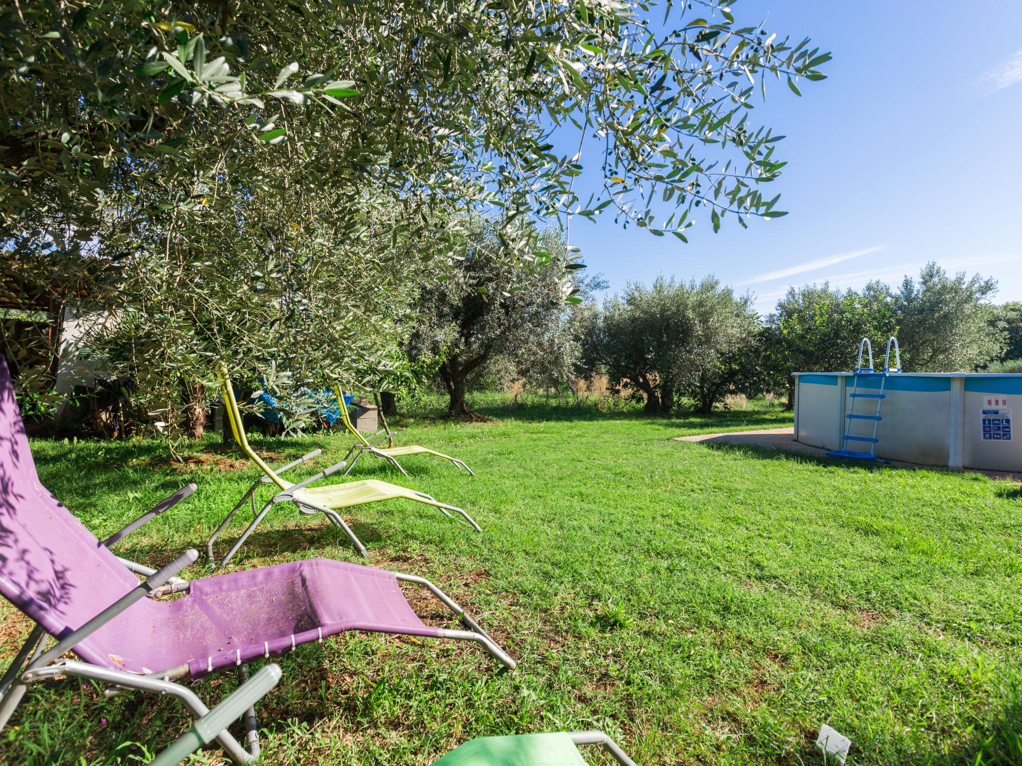 Foto 21 - Appartamento con 3 camere da letto a Umag con piscina e giardino