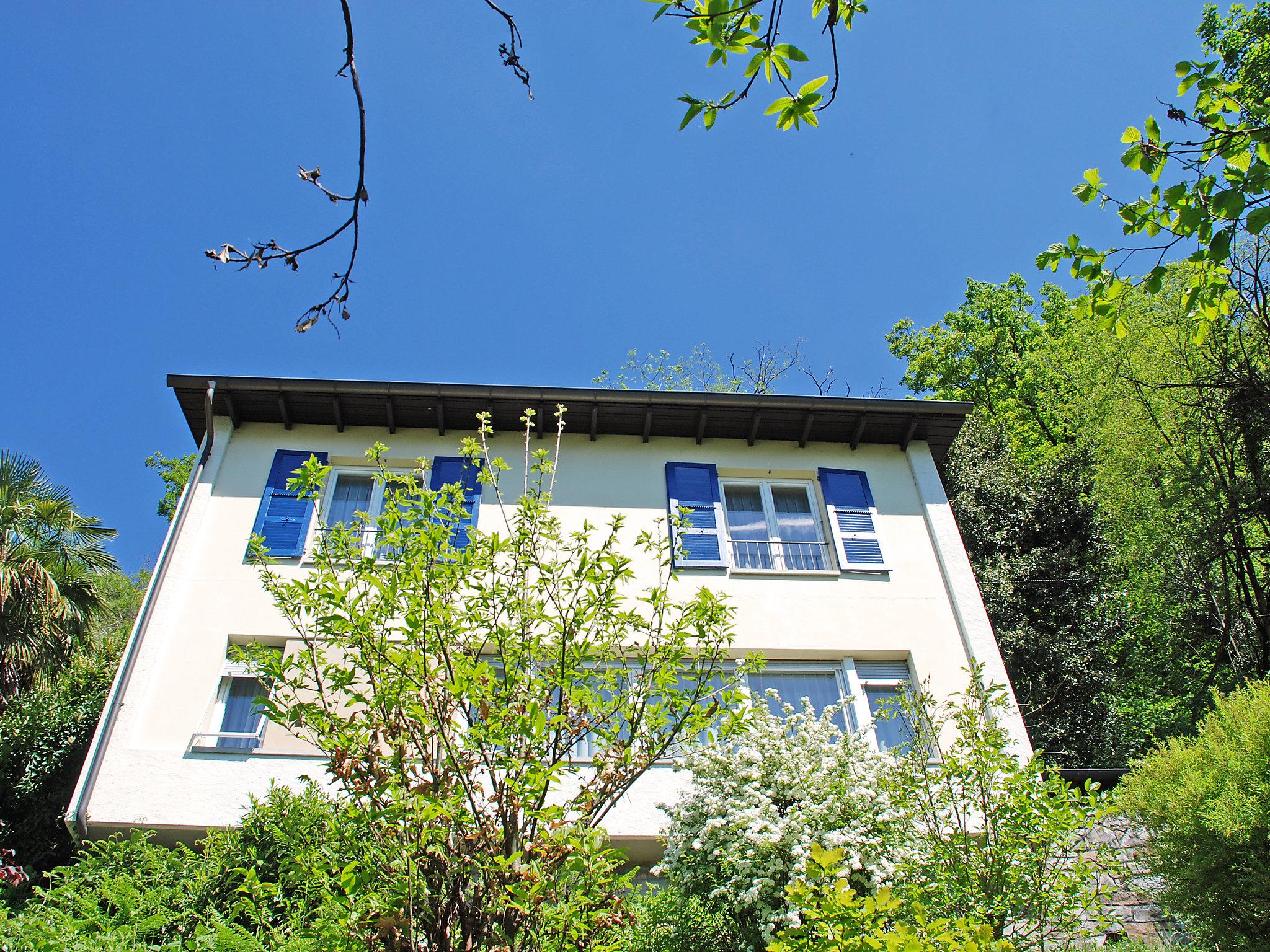 Foto 1 - Casa de 3 habitaciones en Bissone con terraza y vistas a la montaña