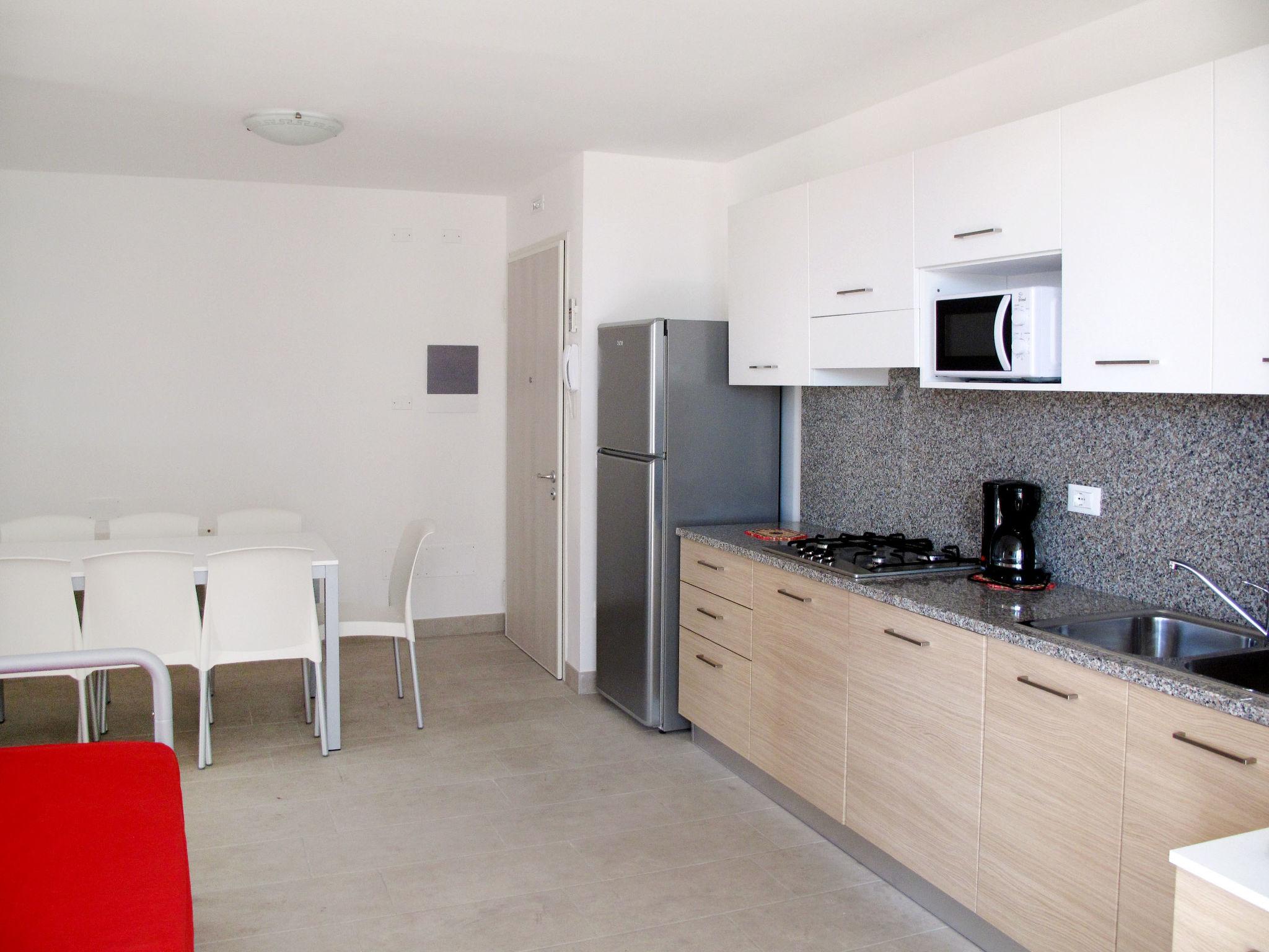 Foto 7 - Apartamento de 2 habitaciones en Lignano Sabbiadoro con piscina