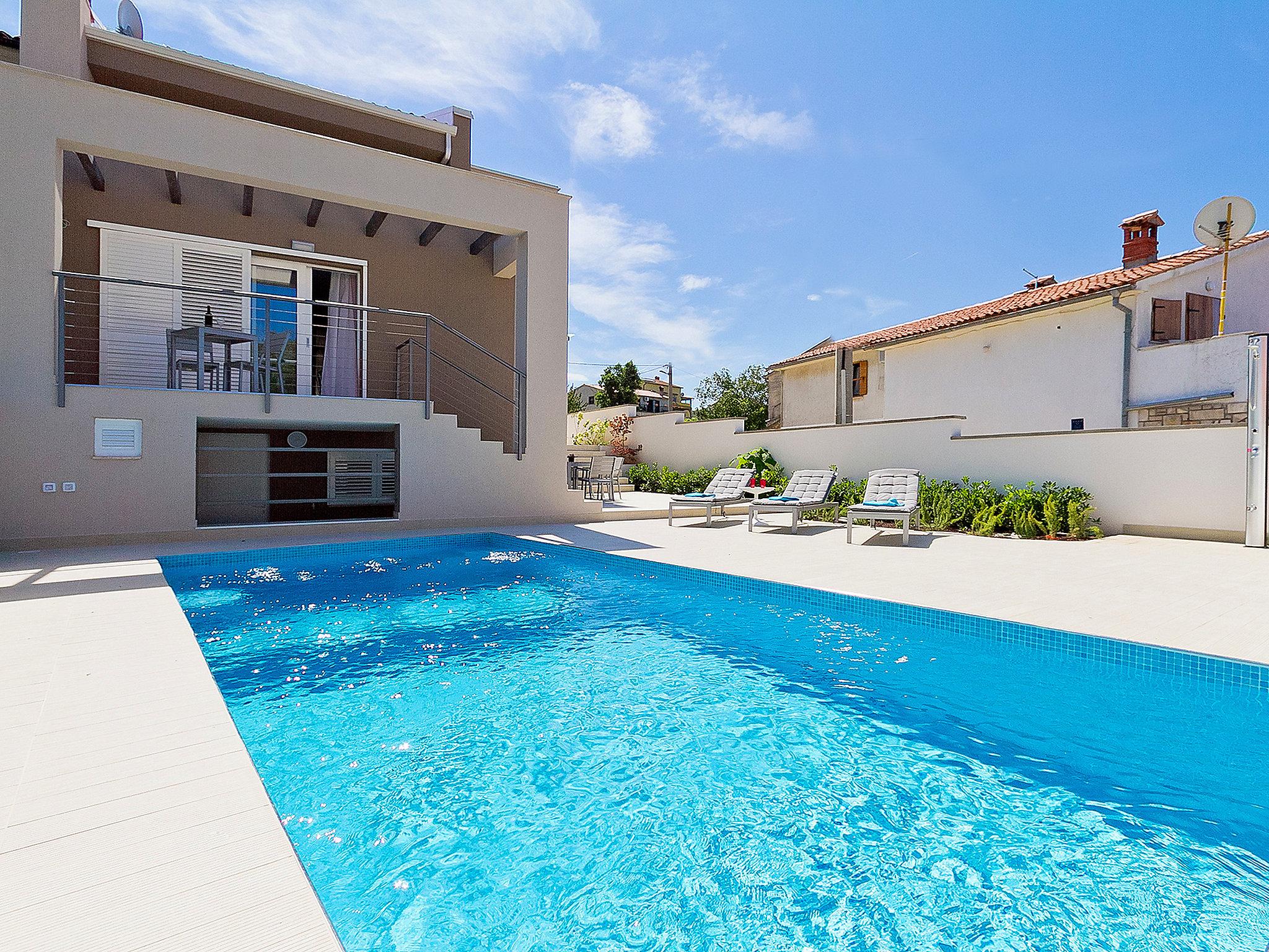 Foto 27 - Casa de 3 quartos em Labin com piscina privada e terraço