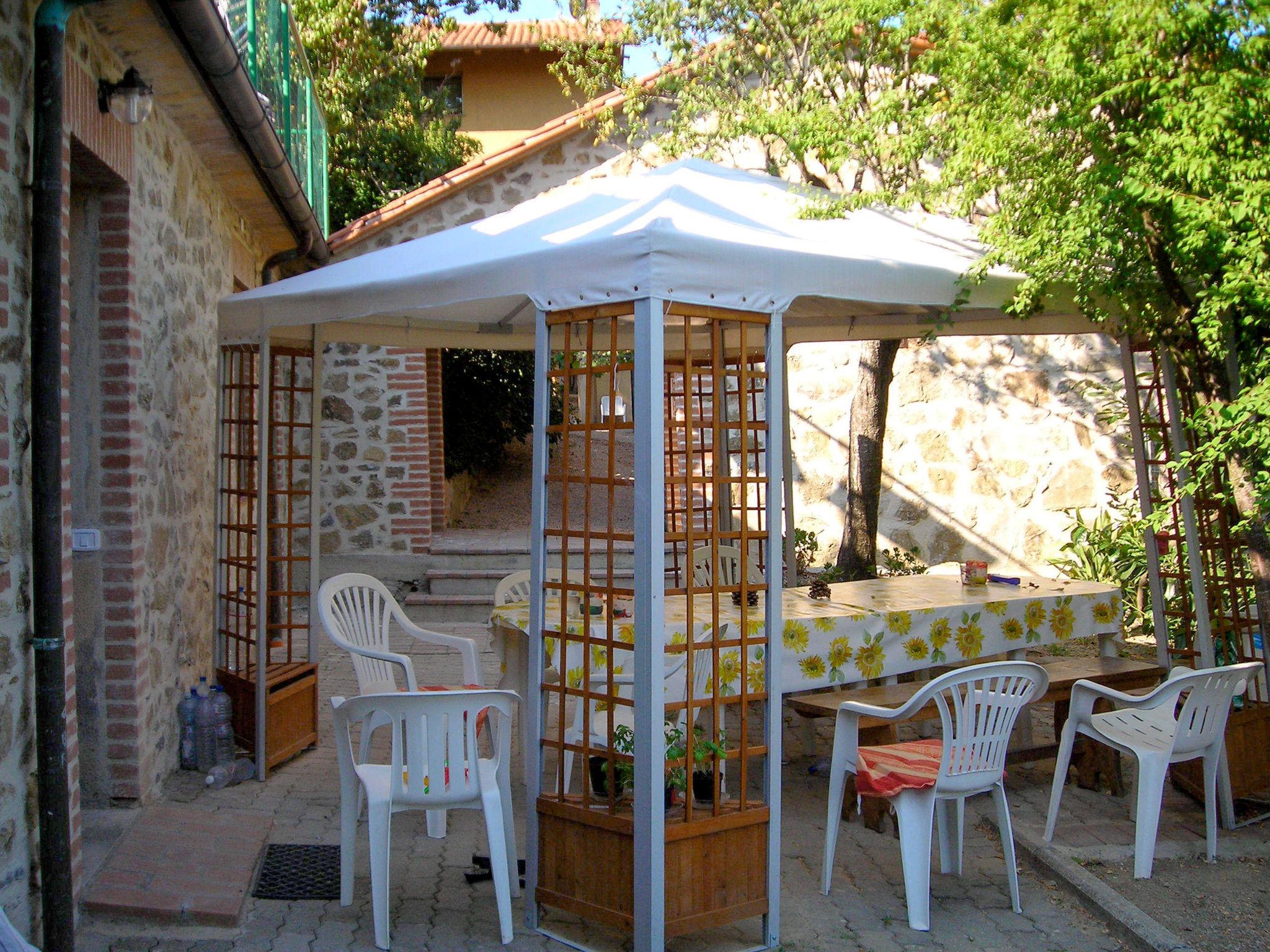 Foto 4 - Appartamento con 2 camere da letto a Paciano con piscina e vista sulle montagne