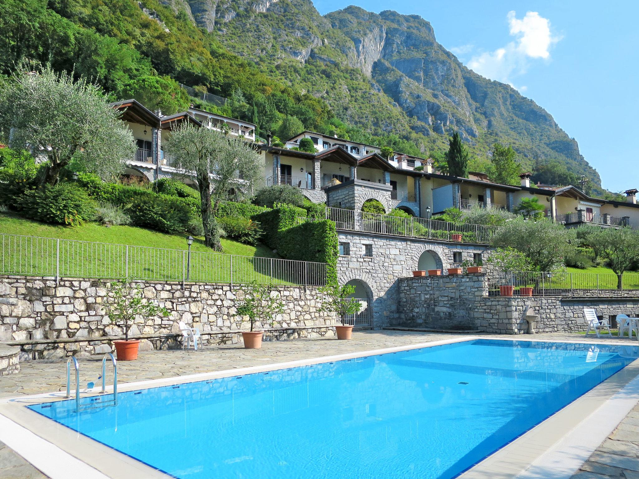 Foto 1 - Apartment mit 2 Schlafzimmern in Valsolda mit schwimmbad und blick auf die berge