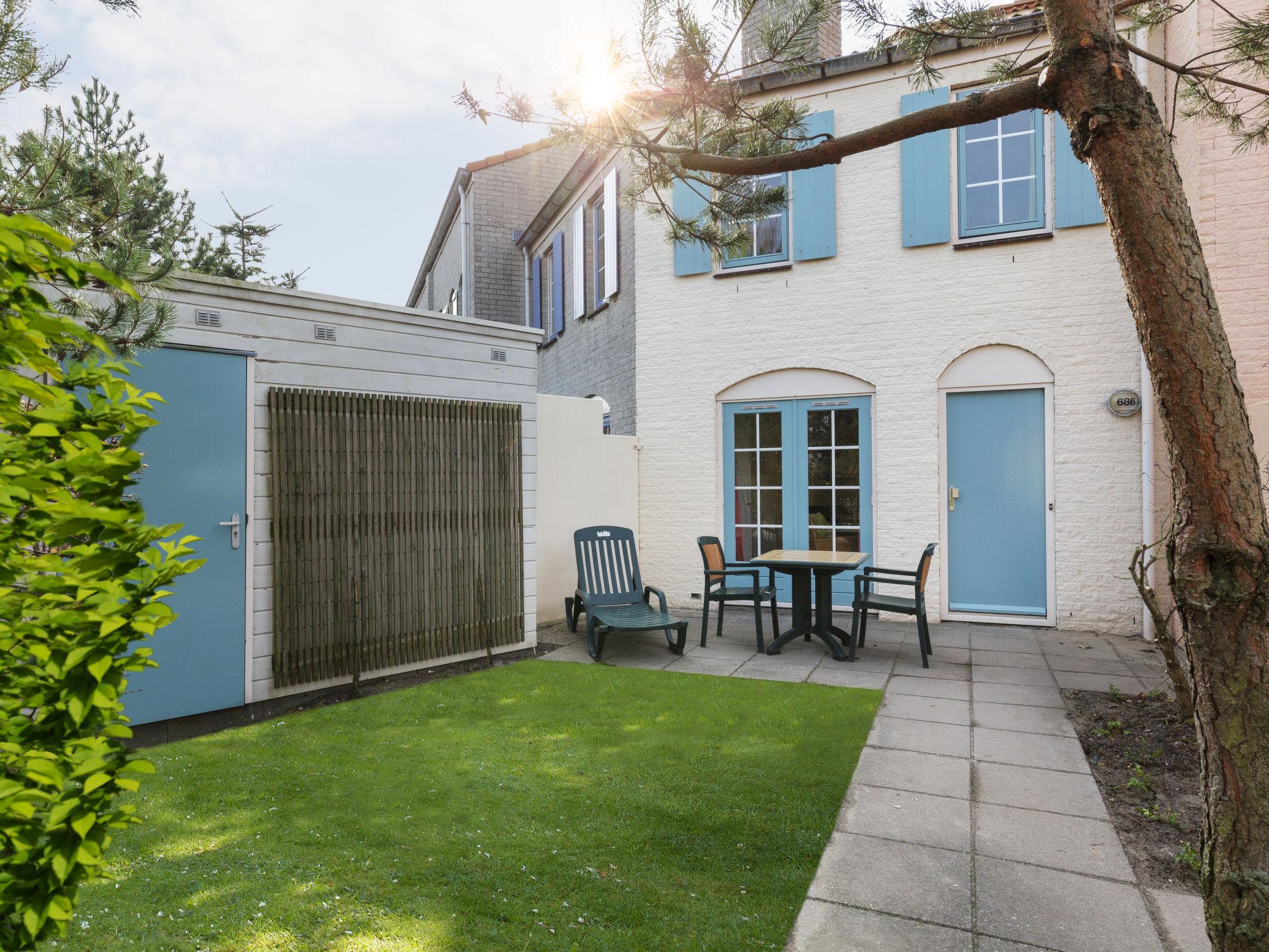 Photo 1 - Maison de 1 chambre à Ouddorp avec piscine et vues à la mer