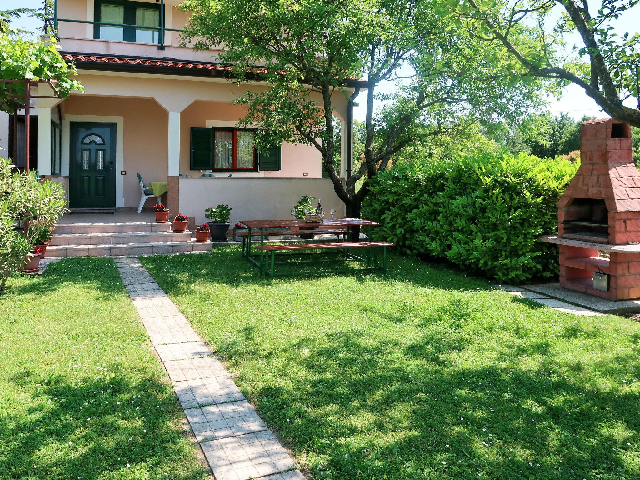 Photo 4 - Maison de 2 chambres à Labin avec piscine privée et jardin