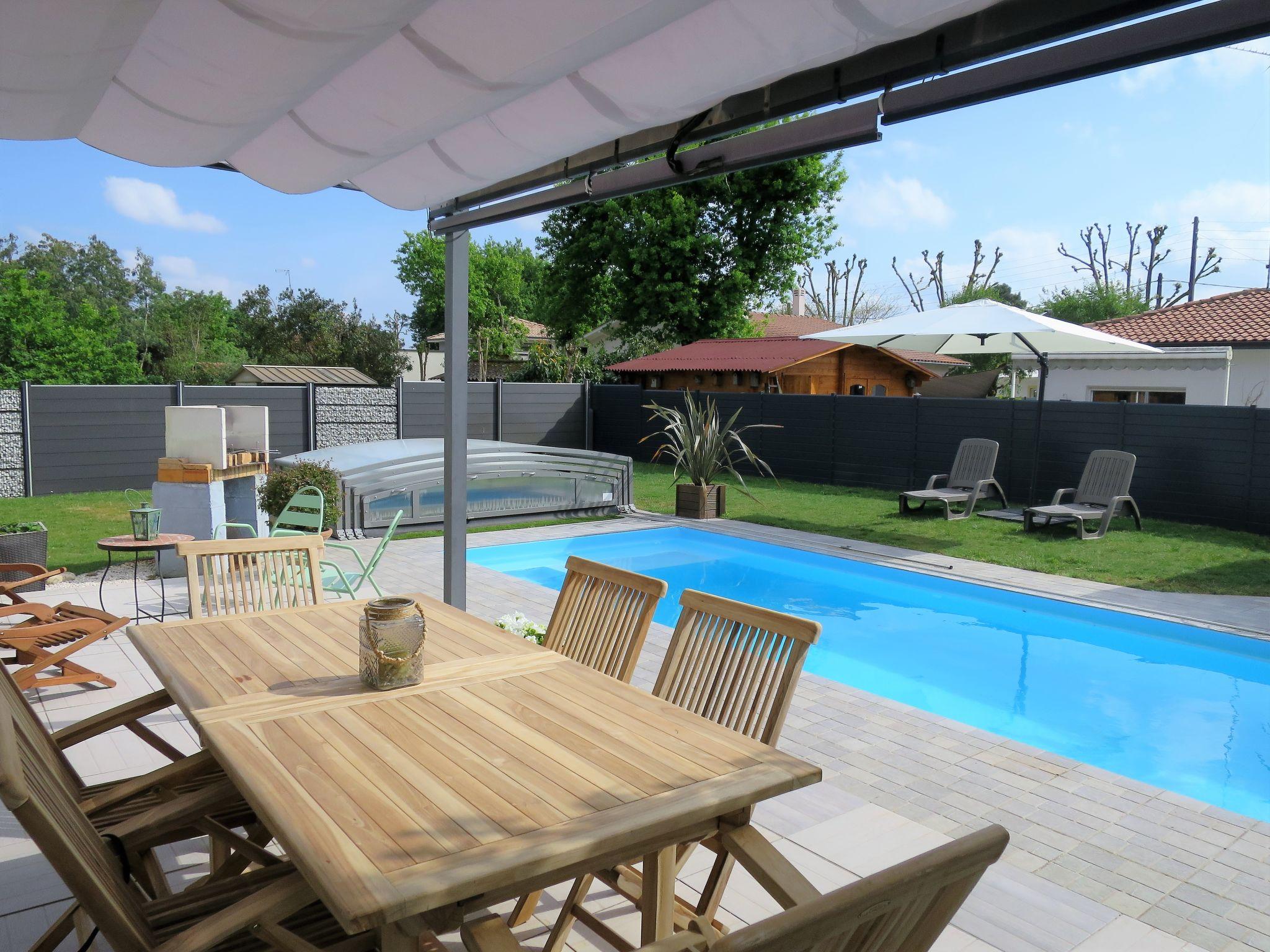 Foto 20 - Casa con 3 camere da letto a Andernos-les-Bains con piscina privata e vista mare