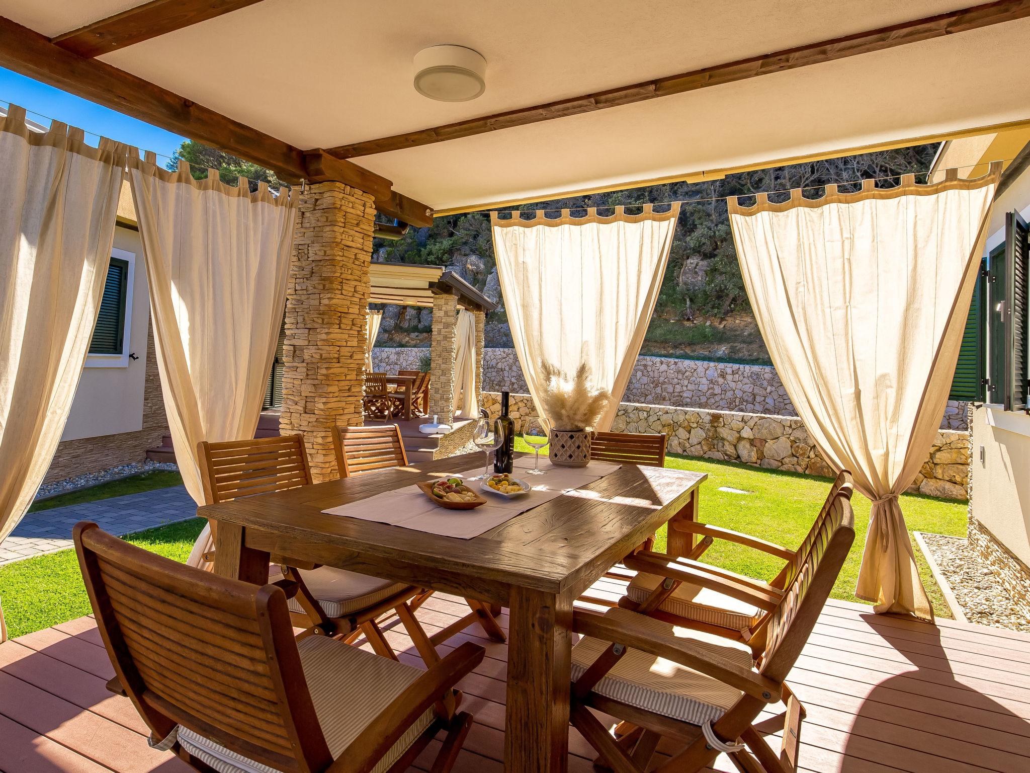 Photo 12 - Maison de 2 chambres à Rab avec piscine et terrasse