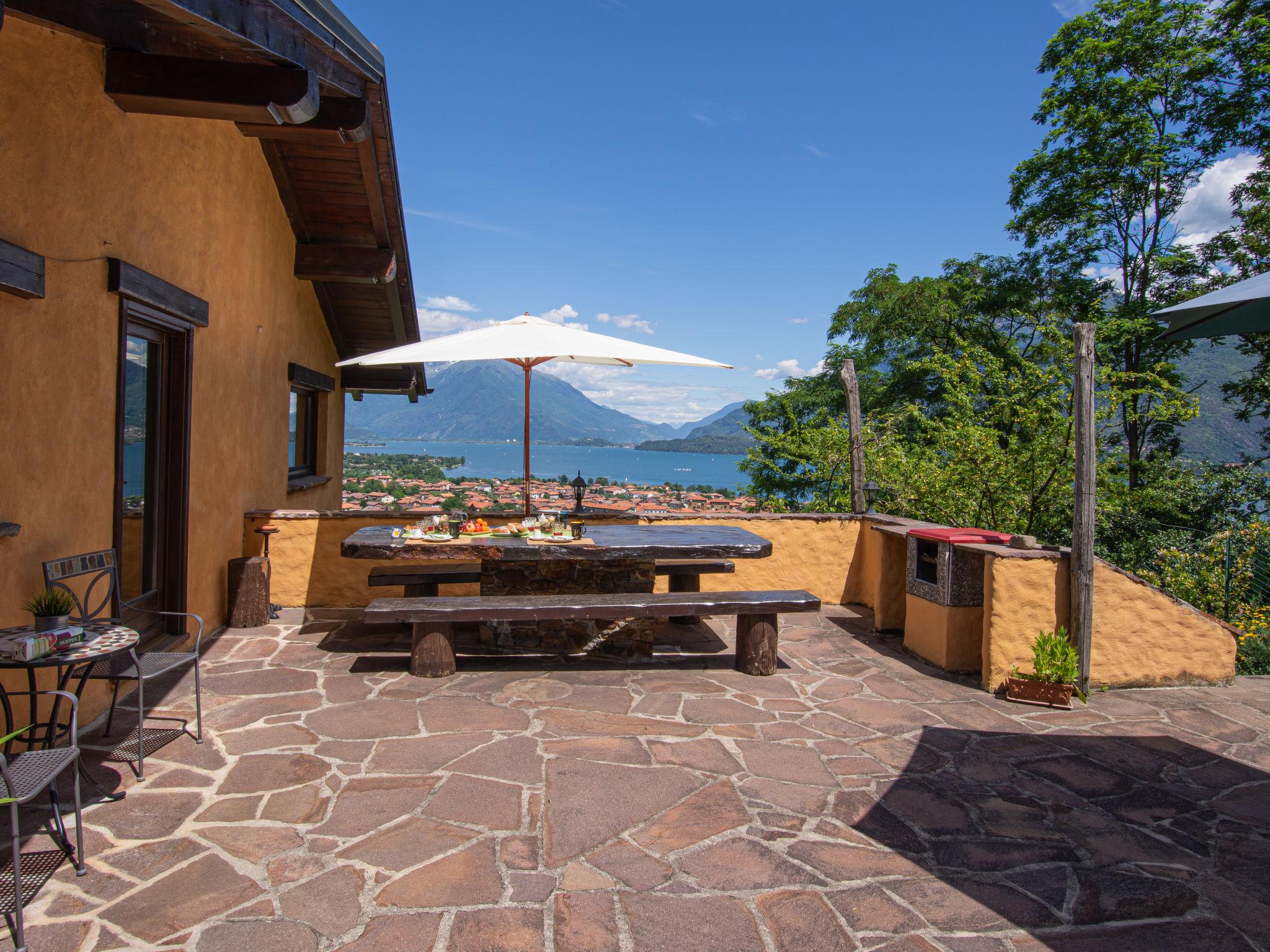 Foto 25 - Casa de 2 habitaciones en Dongo con piscina privada y vistas a la montaña