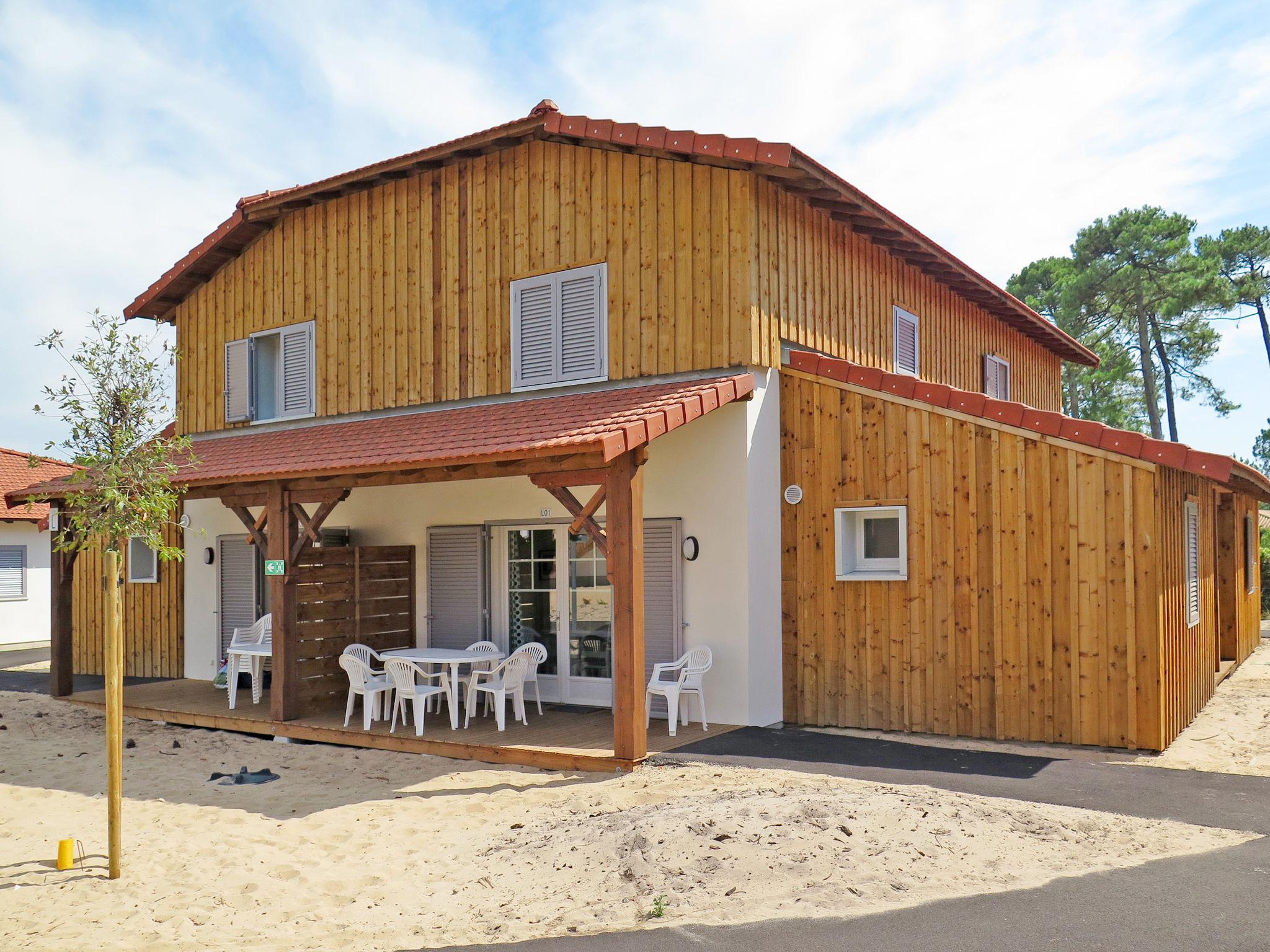 Foto 1 - Casa de 3 quartos em Mimizan com piscina e jardim