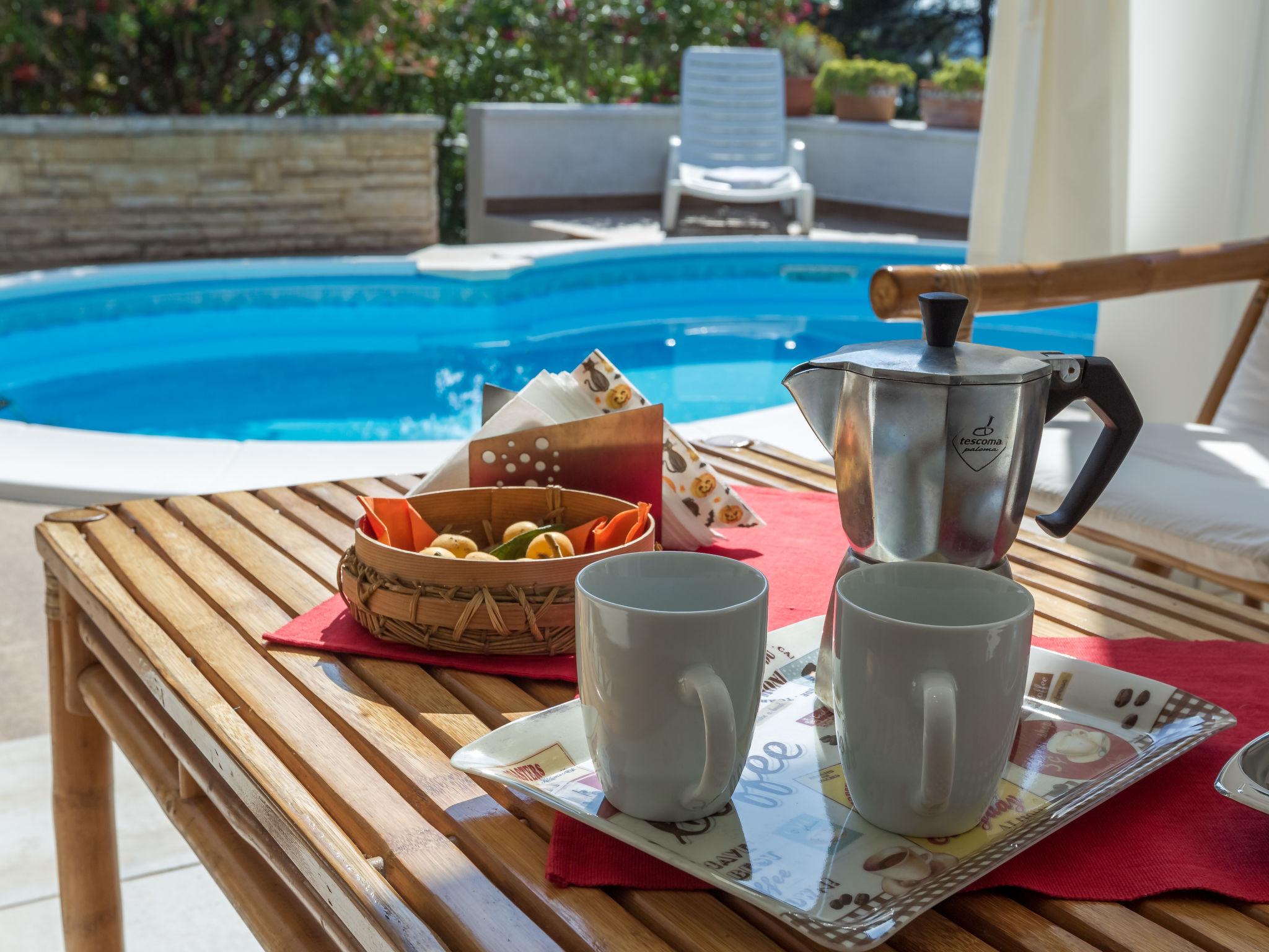 Foto 5 - Casa con 2 camere da letto a Zara con piscina privata e vista mare