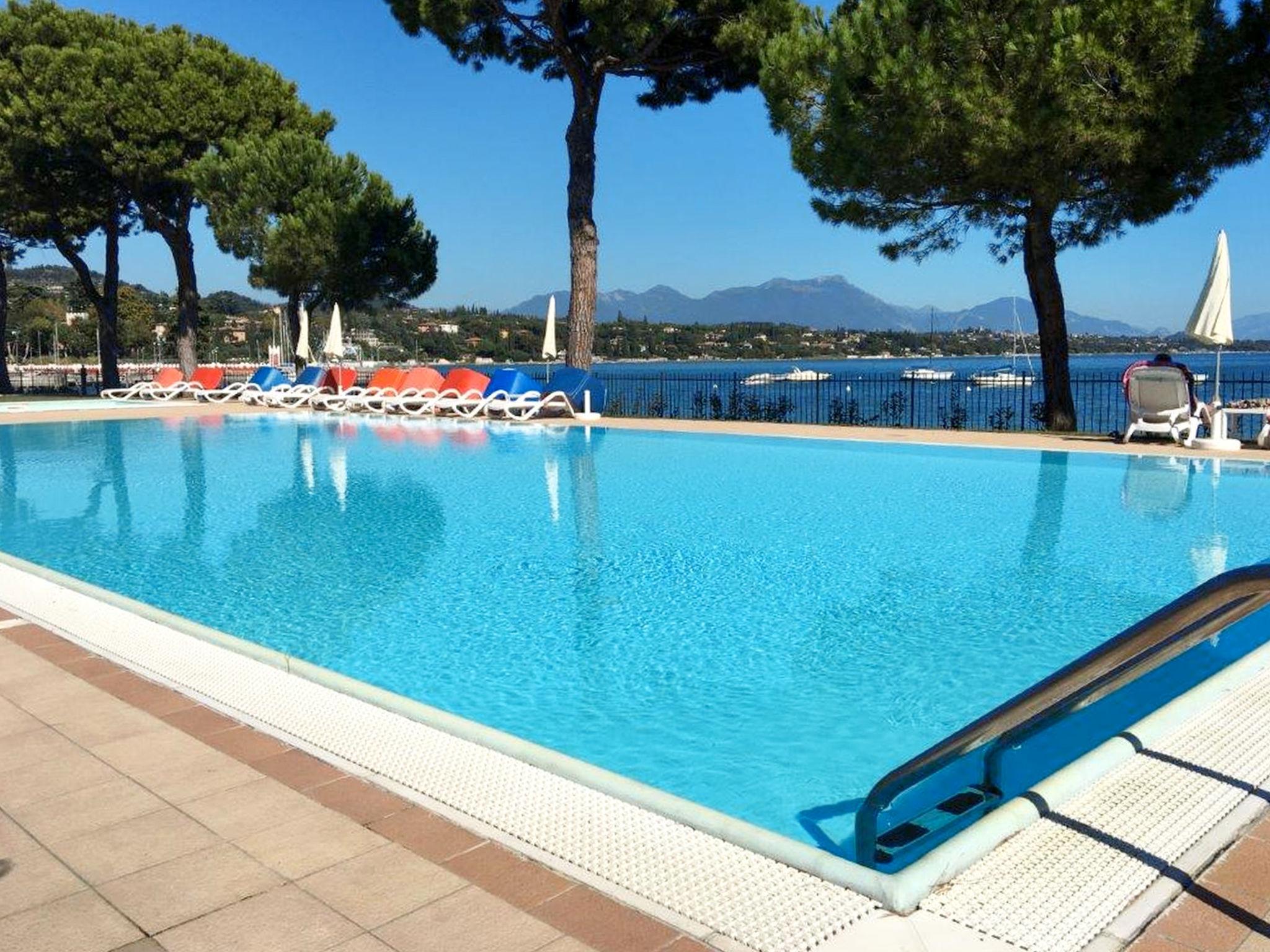 Photo 14 - Maison de 1 chambre à Padenghe sul Garda avec piscine et vues sur la montagne