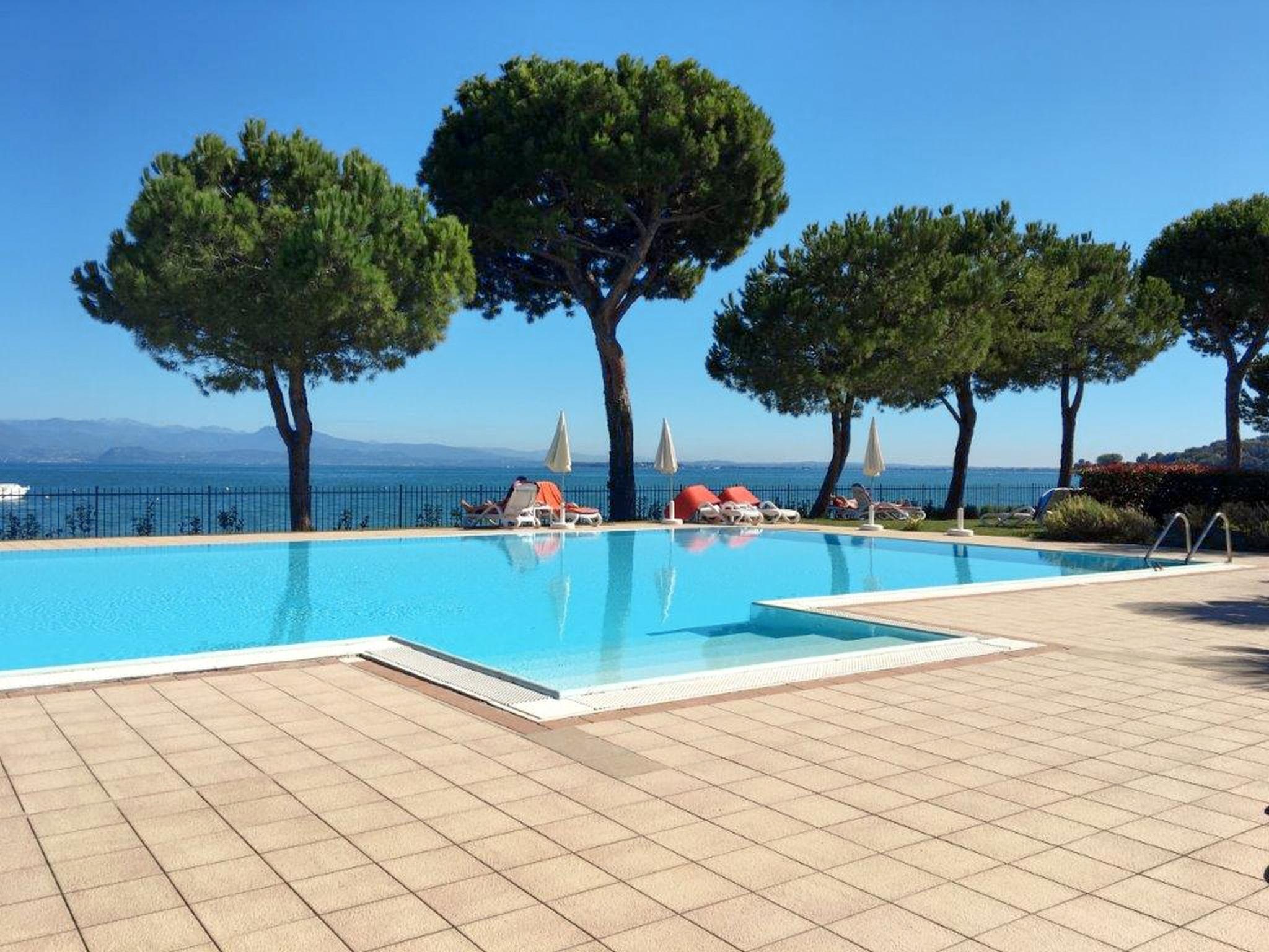 Photo 15 - Maison de 1 chambre à Padenghe sul Garda avec piscine et vues sur la montagne