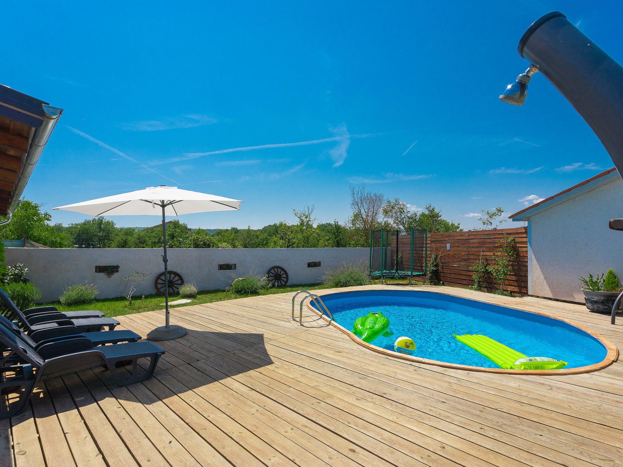 Foto 4 - Casa con 2 camere da letto a Labin con piscina privata e vista mare