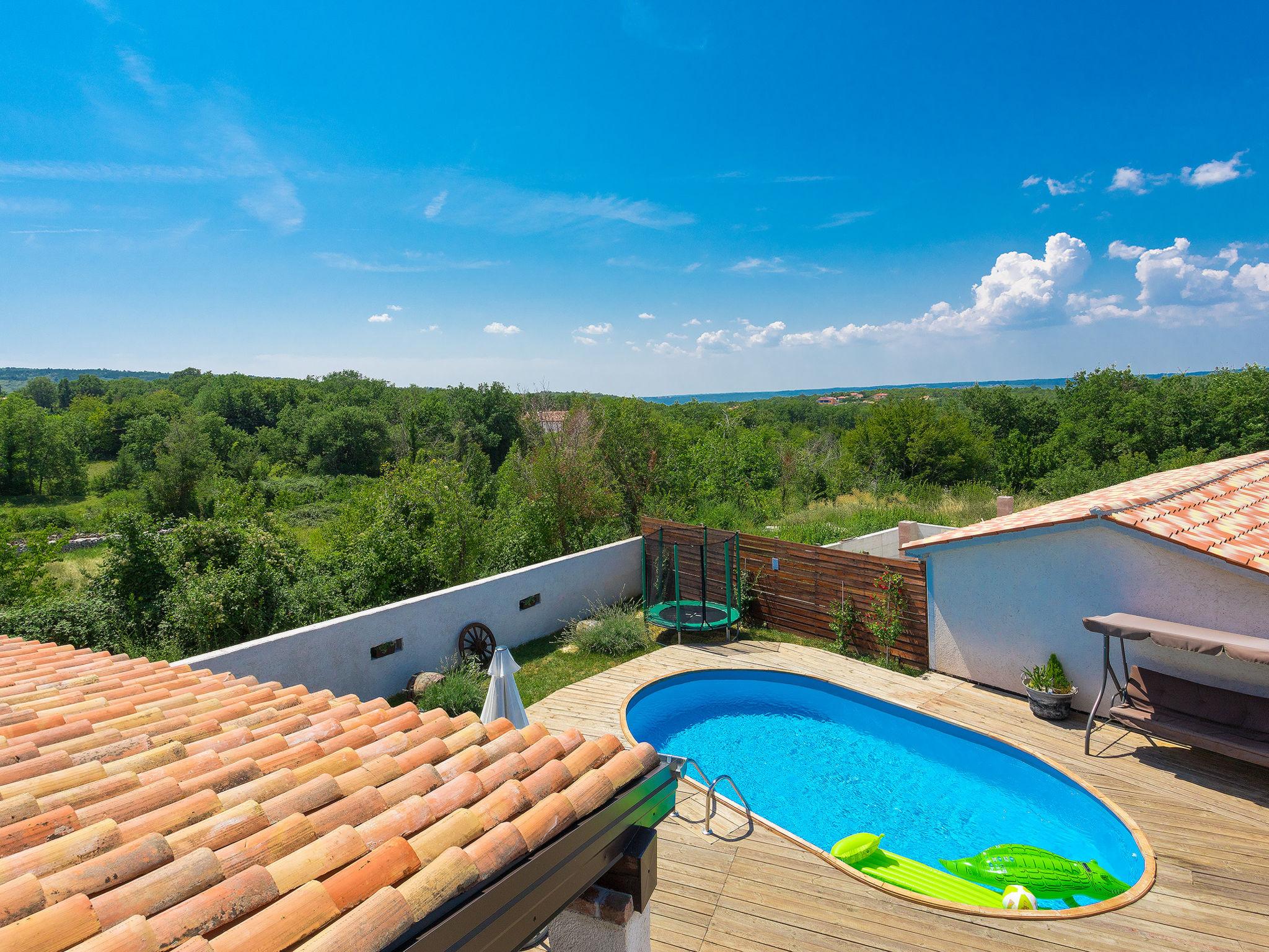 Photo 2 - Maison de 2 chambres à Labin avec piscine privée et jardin