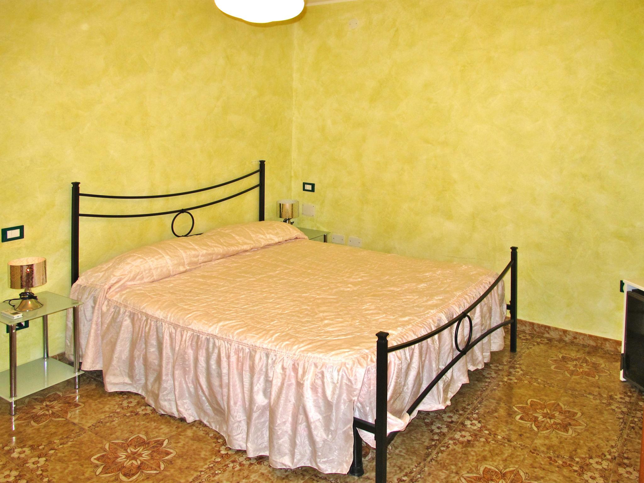 Foto 15 - Casa con 4 camere da letto a Sorso con giardino e vista mare