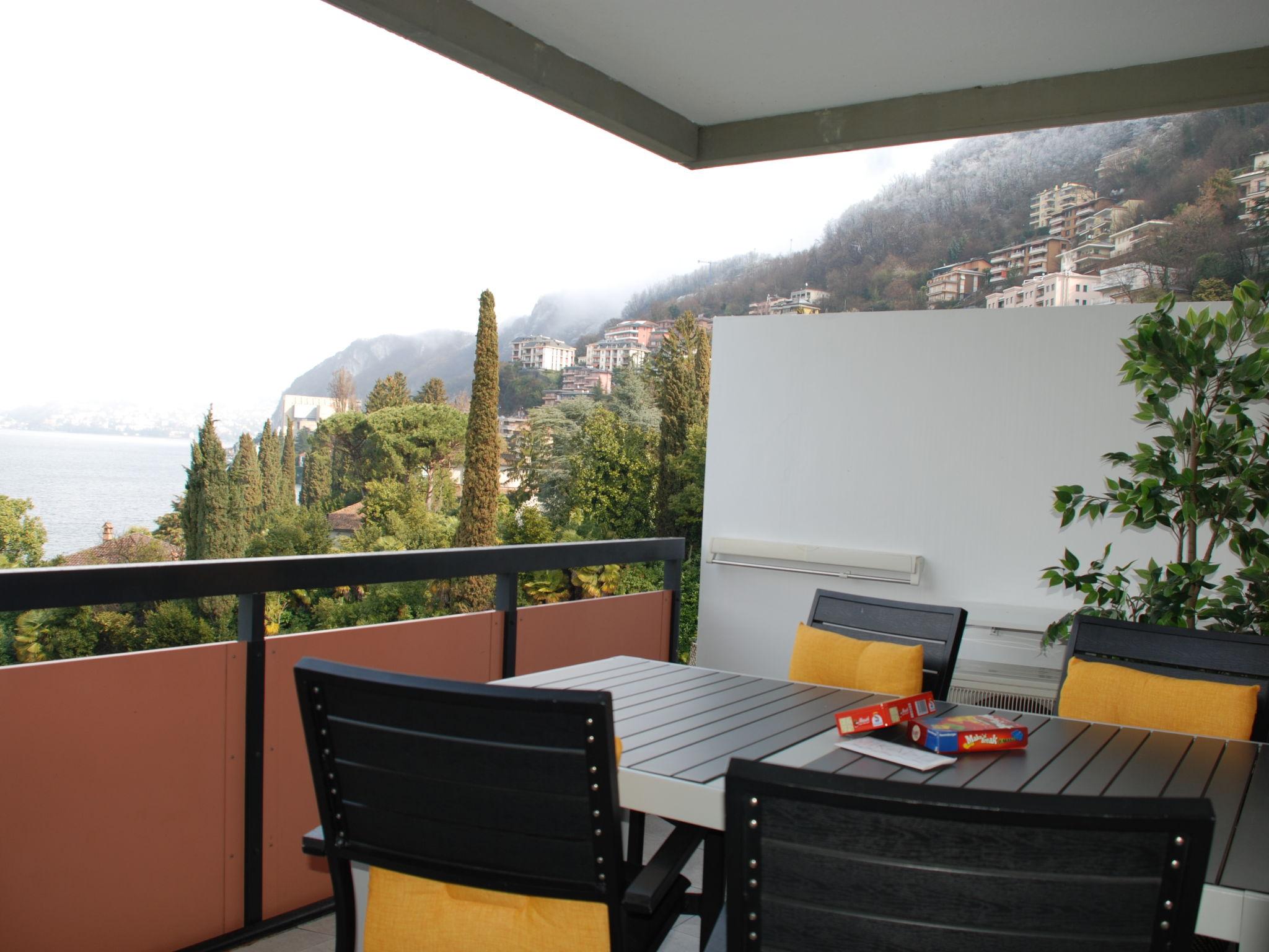 Foto 1 - Apartamento de 1 habitación en Bissone con piscina y vistas a la montaña