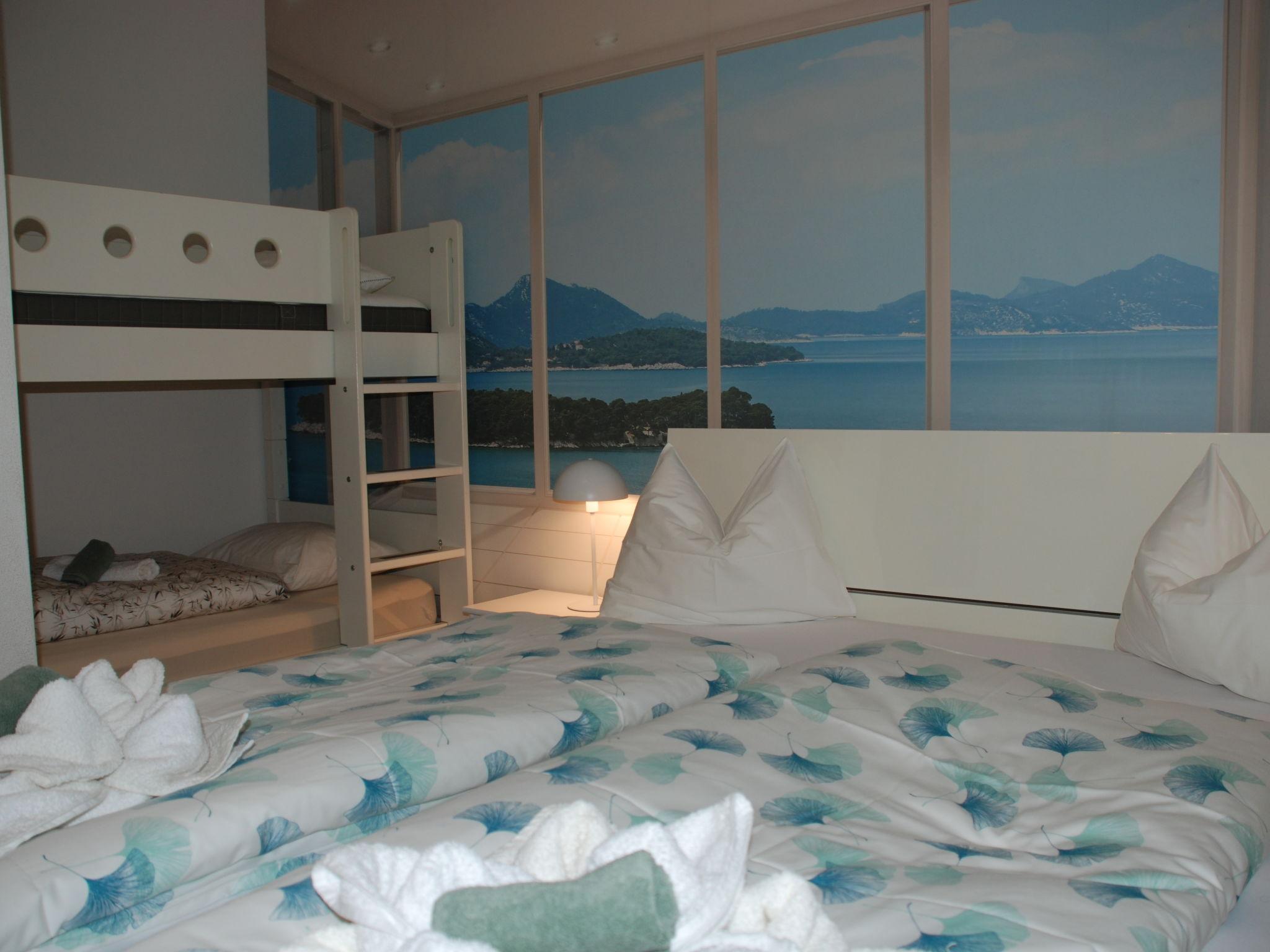 Foto 3 - Appartamento con 1 camera da letto a Bissone con piscina e vista sulle montagne