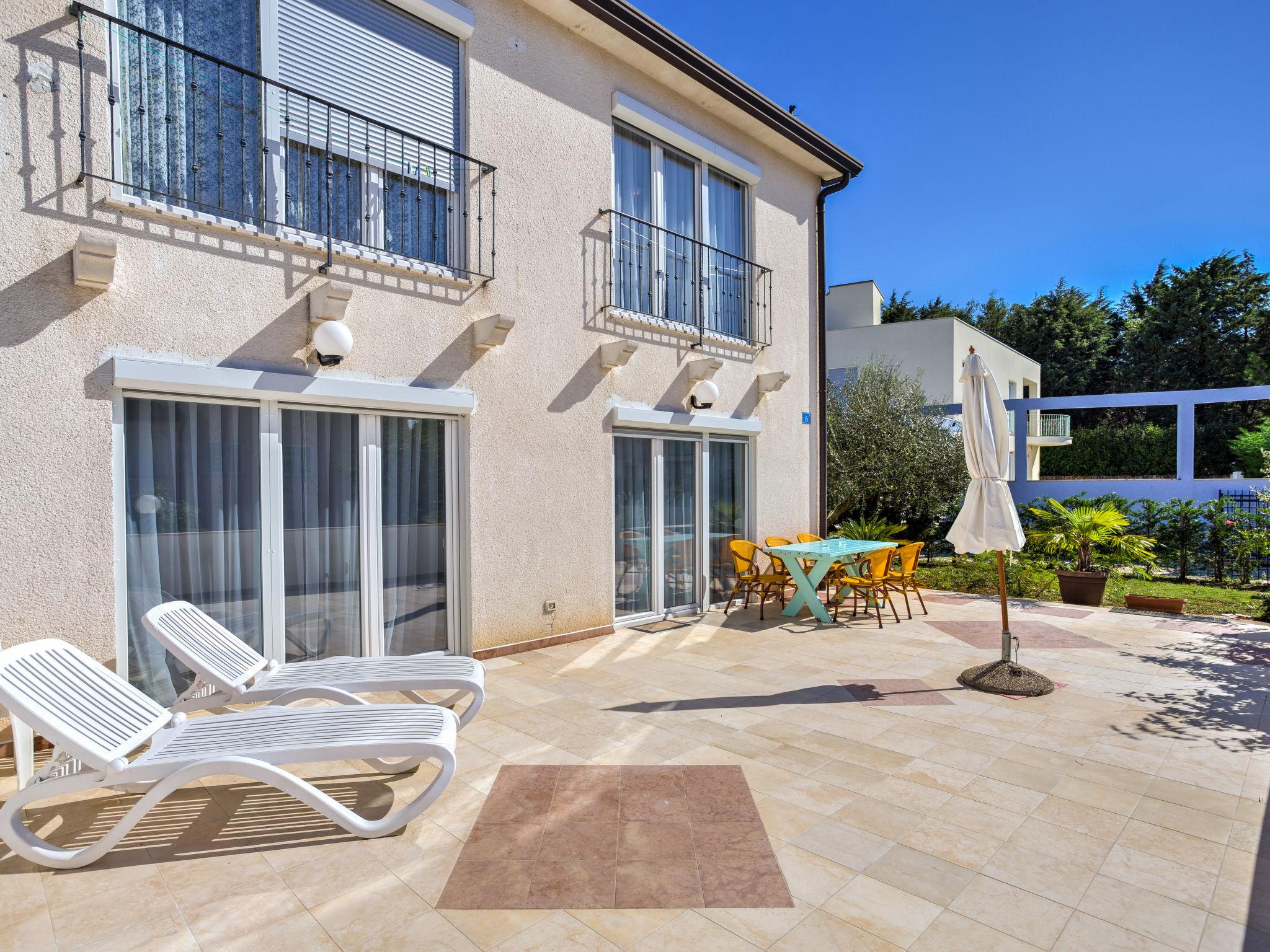 Photo 10 - Appartement de 2 chambres à Umag avec piscine et vues à la mer