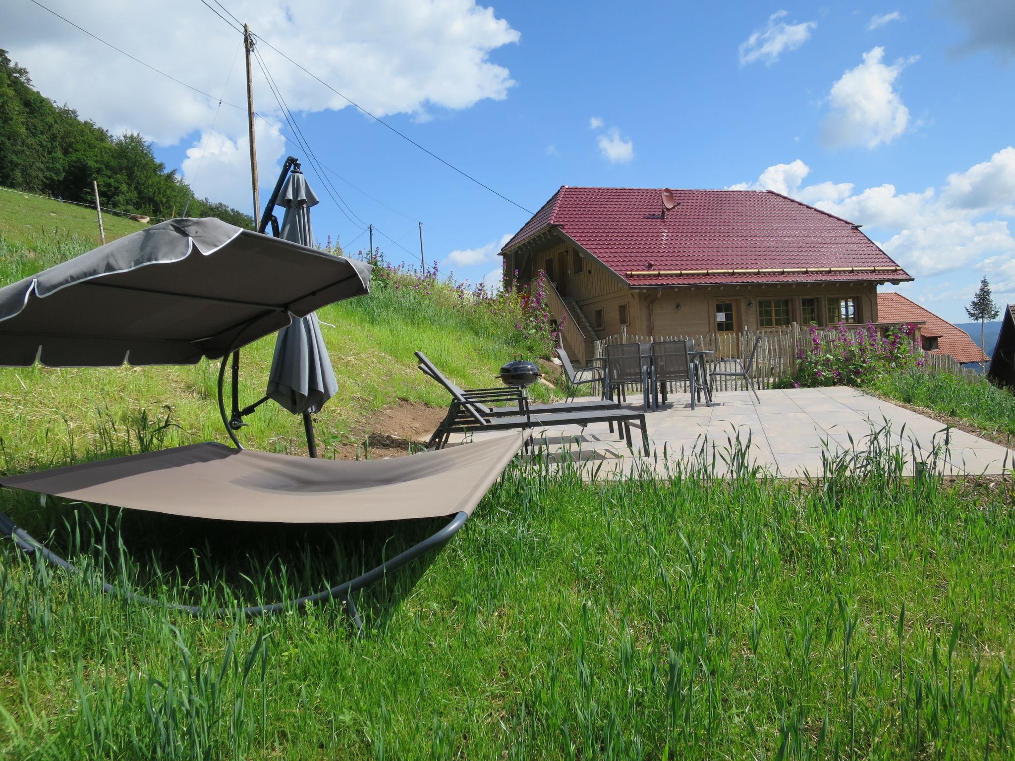 Photo 1 - Appartement de 2 chambres à Hofstetten avec jardin et vues sur la montagne