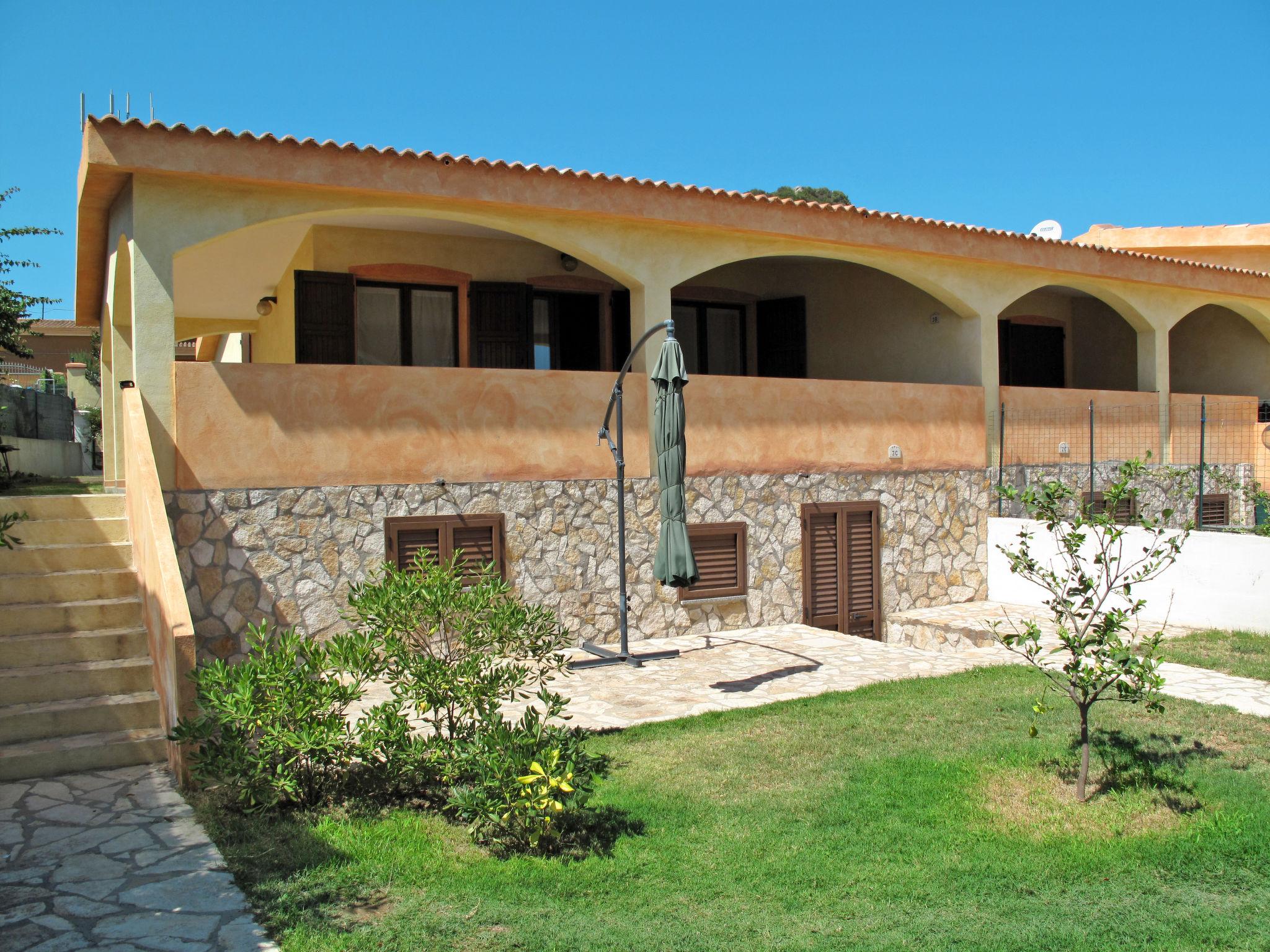 Foto 1 - Casa de 2 habitaciones en Muravera con jardín y vistas al mar