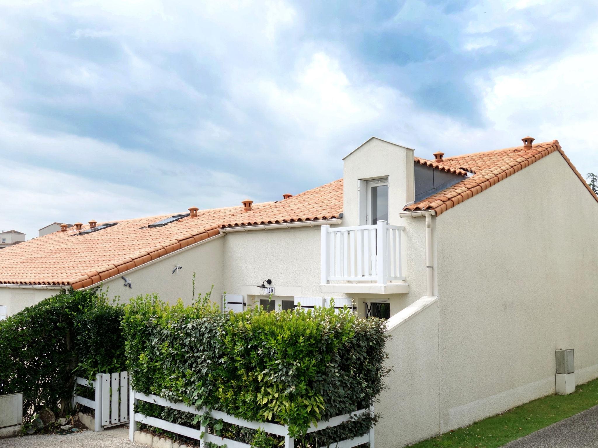 Foto 1 - Casa de 2 habitaciones en Vaux-sur-Mer con piscina privada y vistas al mar