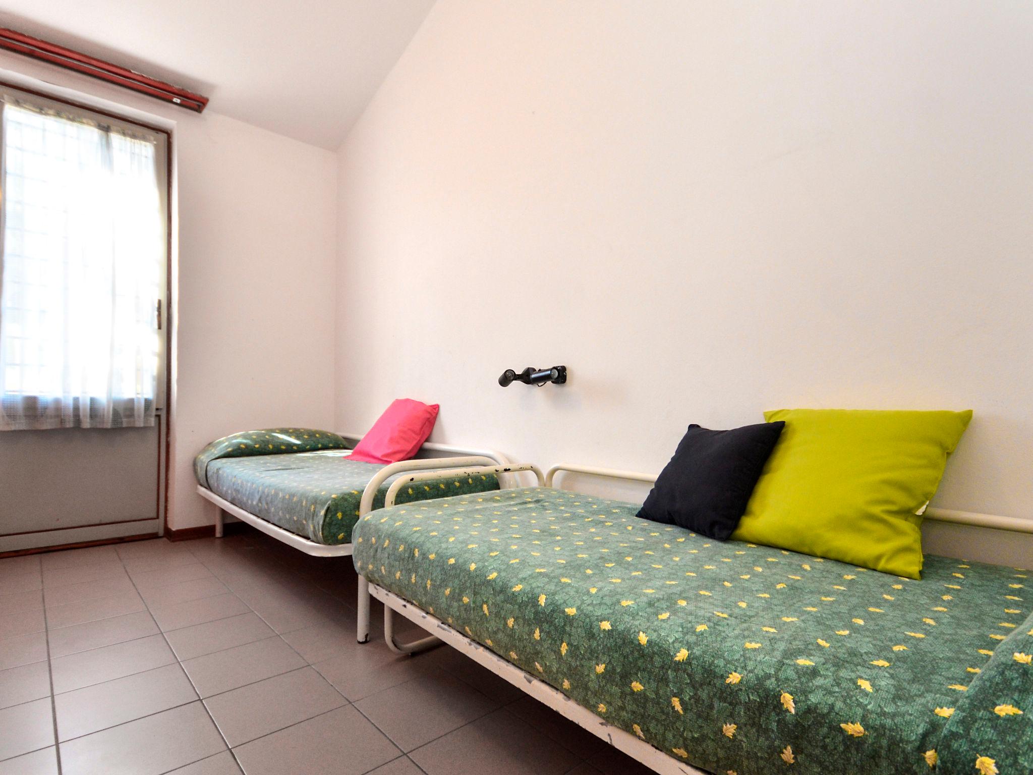 Foto 7 - Casa con 3 camere da letto a Lignano Sabbiadoro con giardino e vista mare