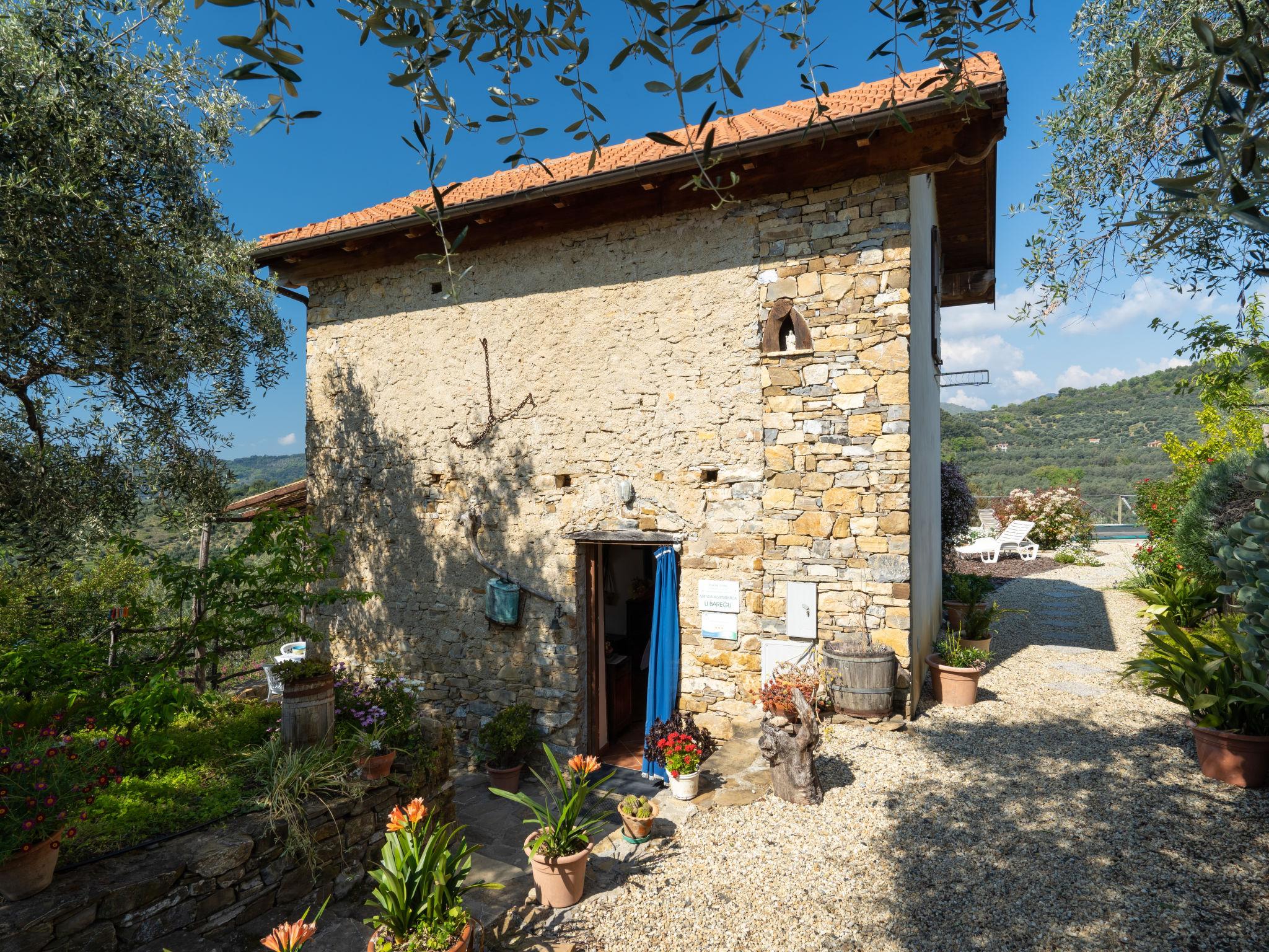 Photo 18 - Maison de 1 chambre à Diano San Pietro avec piscine privée et vues à la mer