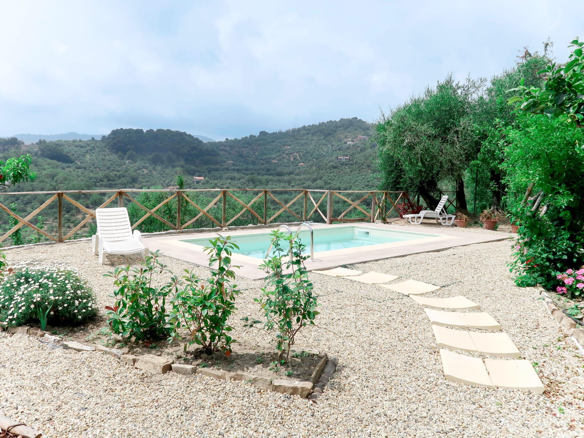 Foto 15 - Casa de 1 quarto em Diano San Pietro com piscina privada e vistas do mar